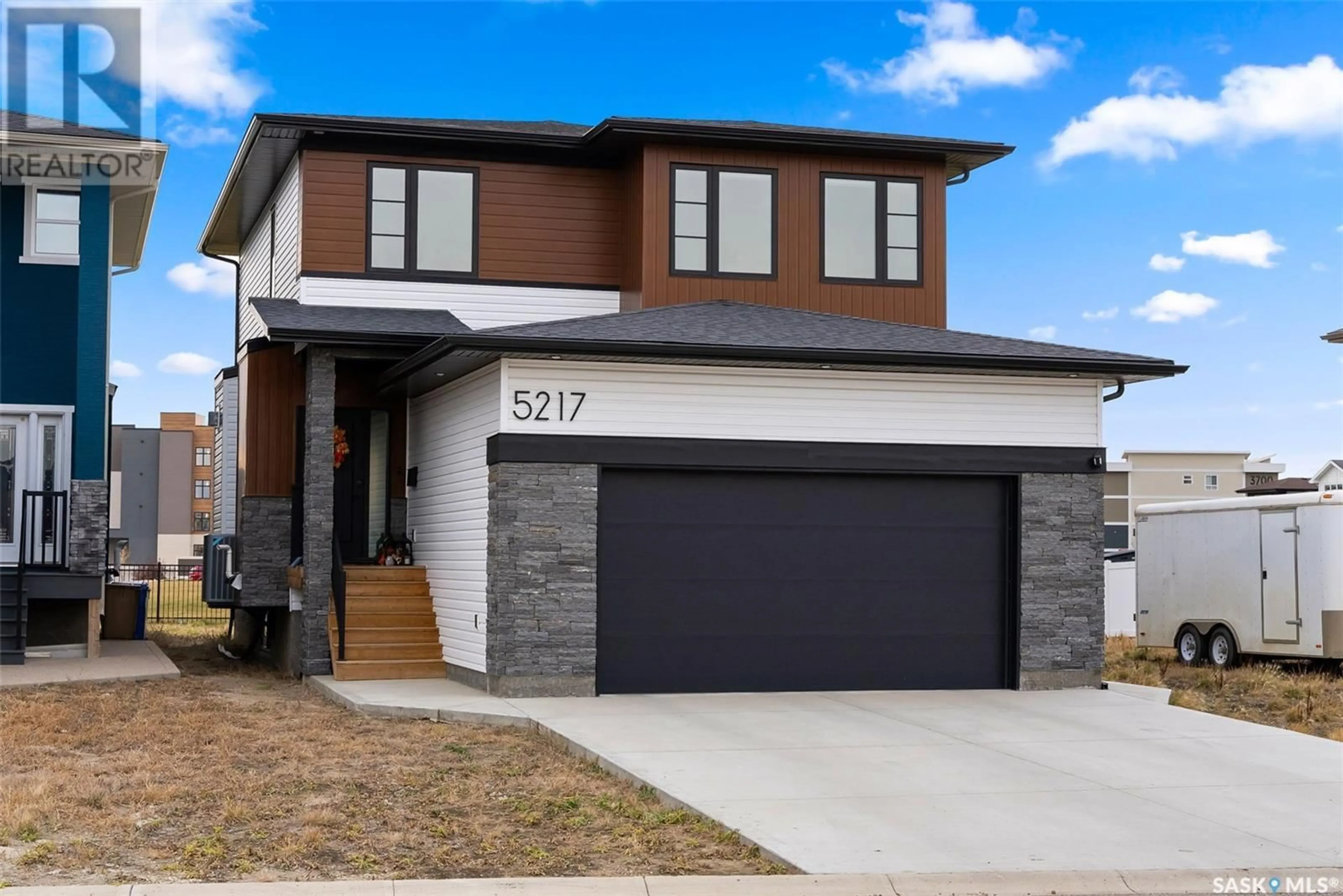 Frontside or backside of a home, the street view for 5217 E Green CRESCENT, Regina Saskatchewan S4V3S9