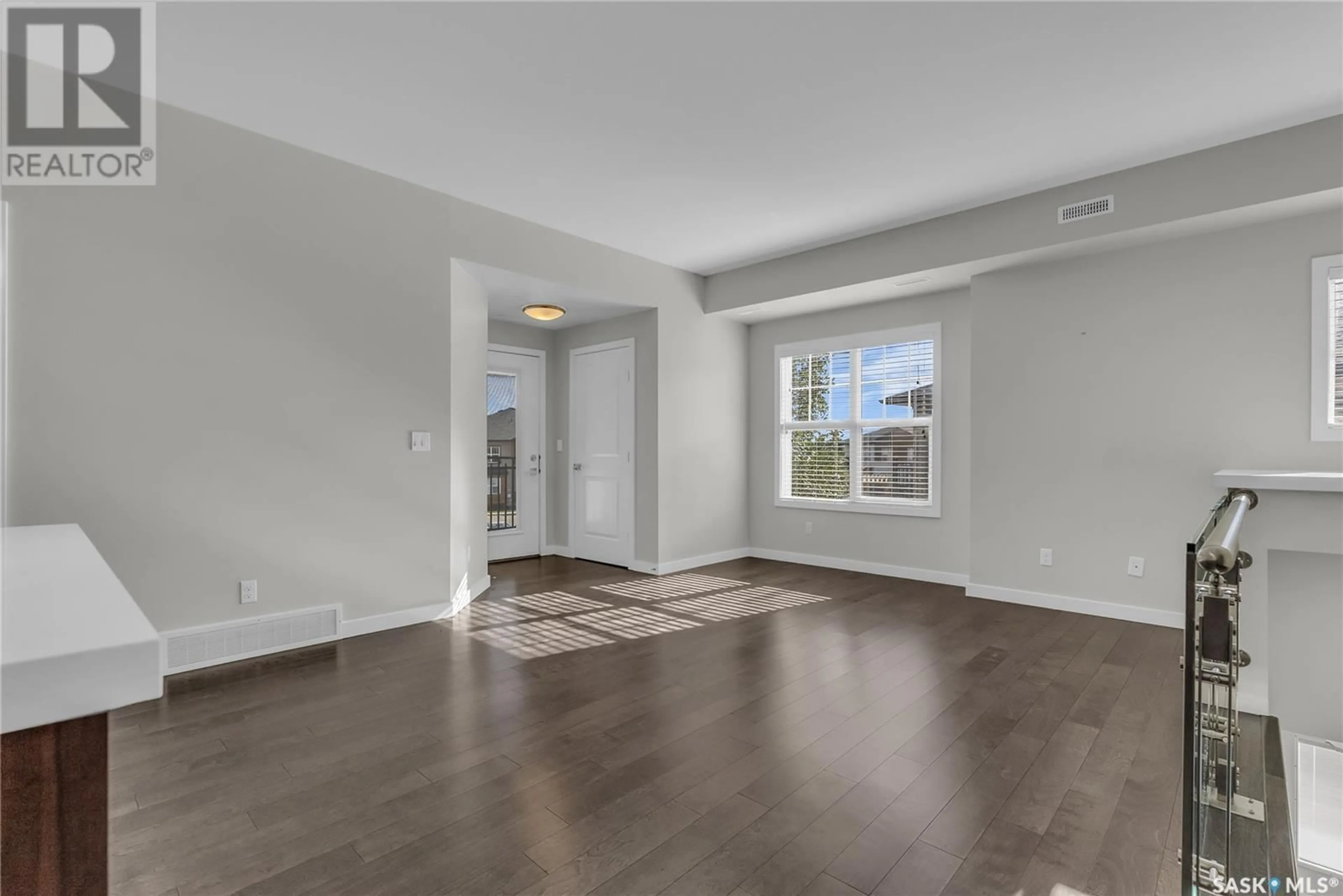 A pic of a room, wood floors for 106 2315 McClocklin ROAD, Saskatoon Saskatchewan S7R0K8