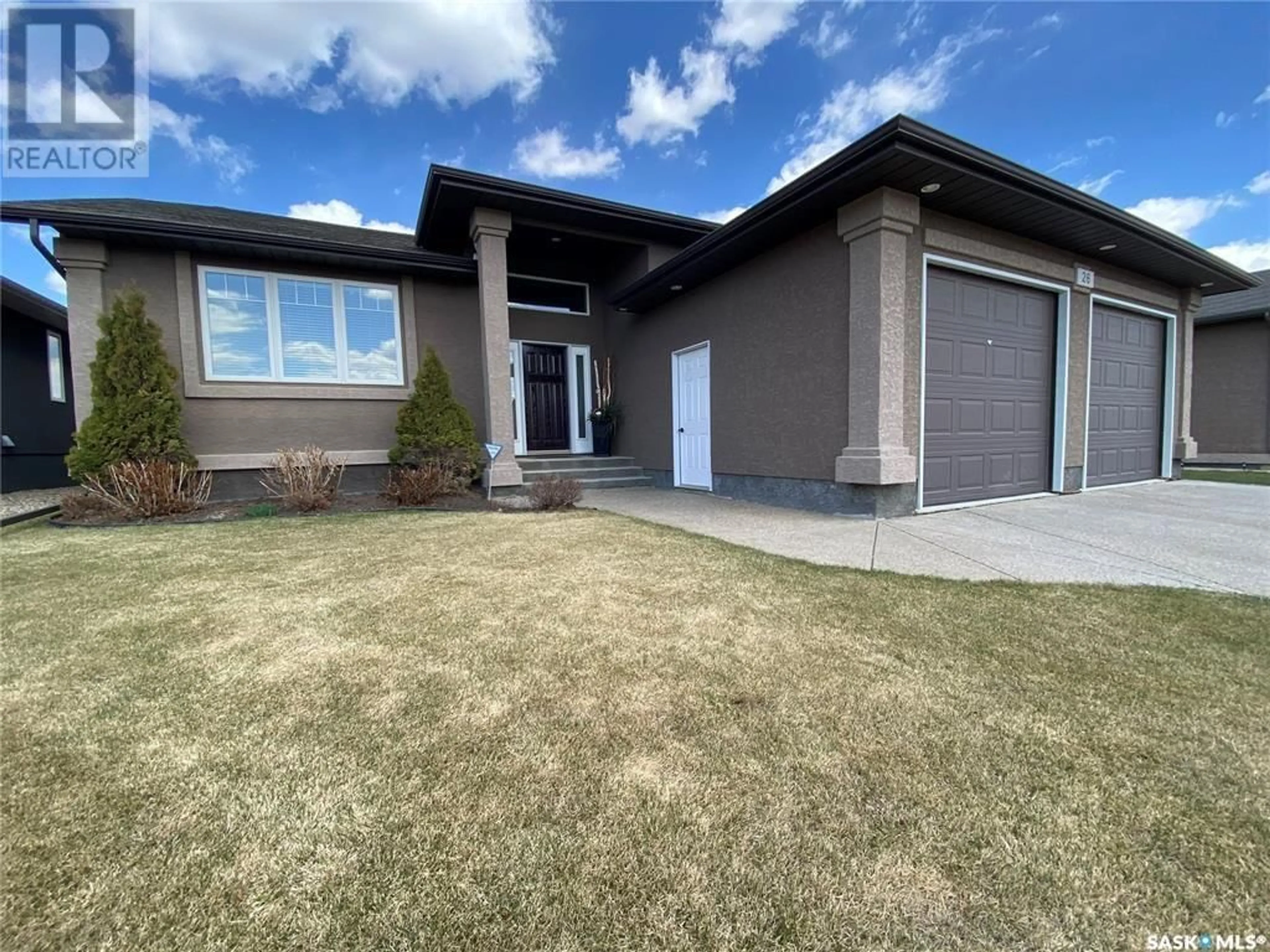 Frontside or backside of a home, the front or back of building for 26 Aspen PLACE, Yorkton Saskatchewan S3N4G5