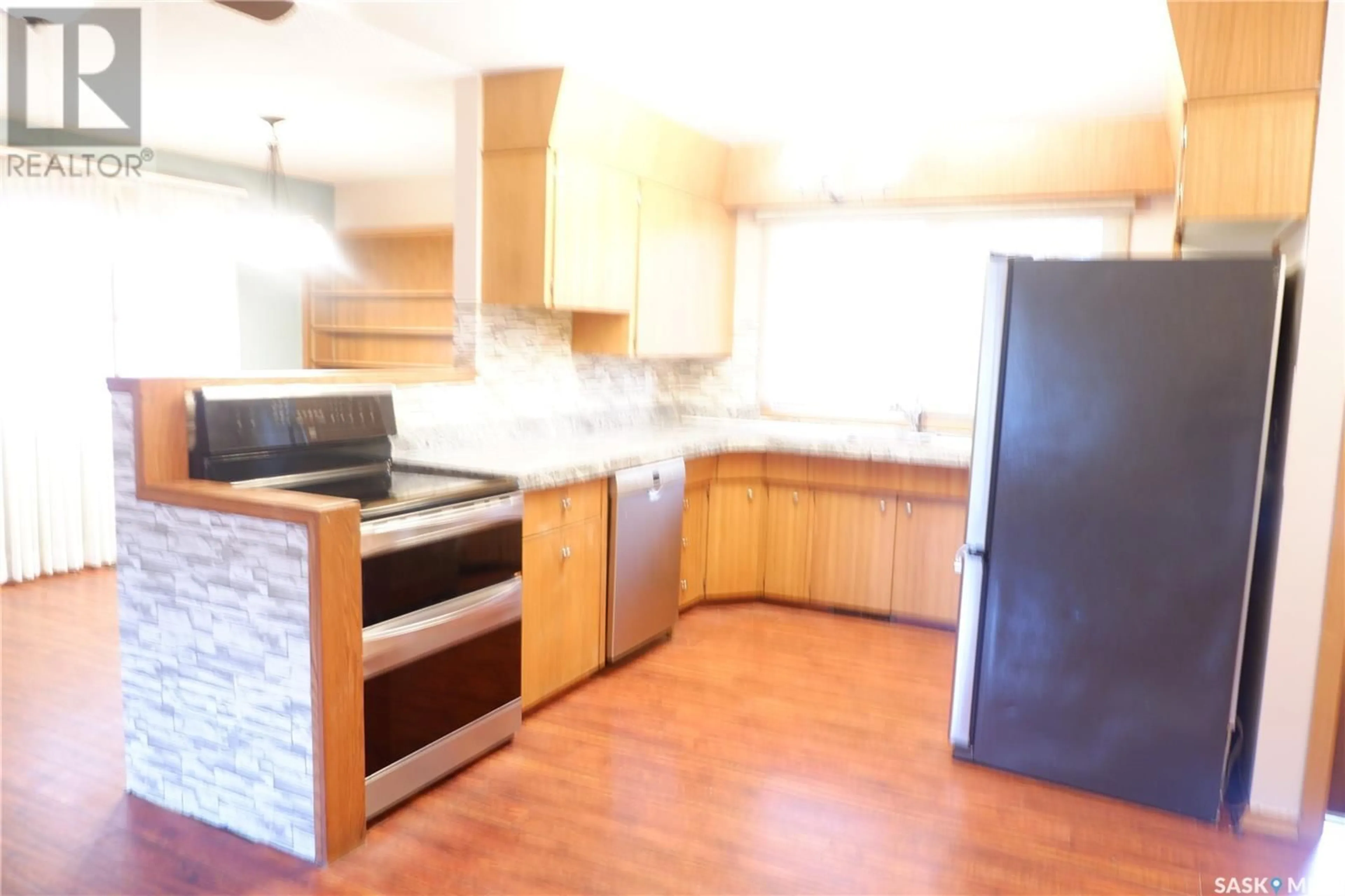 Kitchen, wood floors, cottage for 502 4th AVENUE E, Assiniboia Saskatchewan S0H0B0