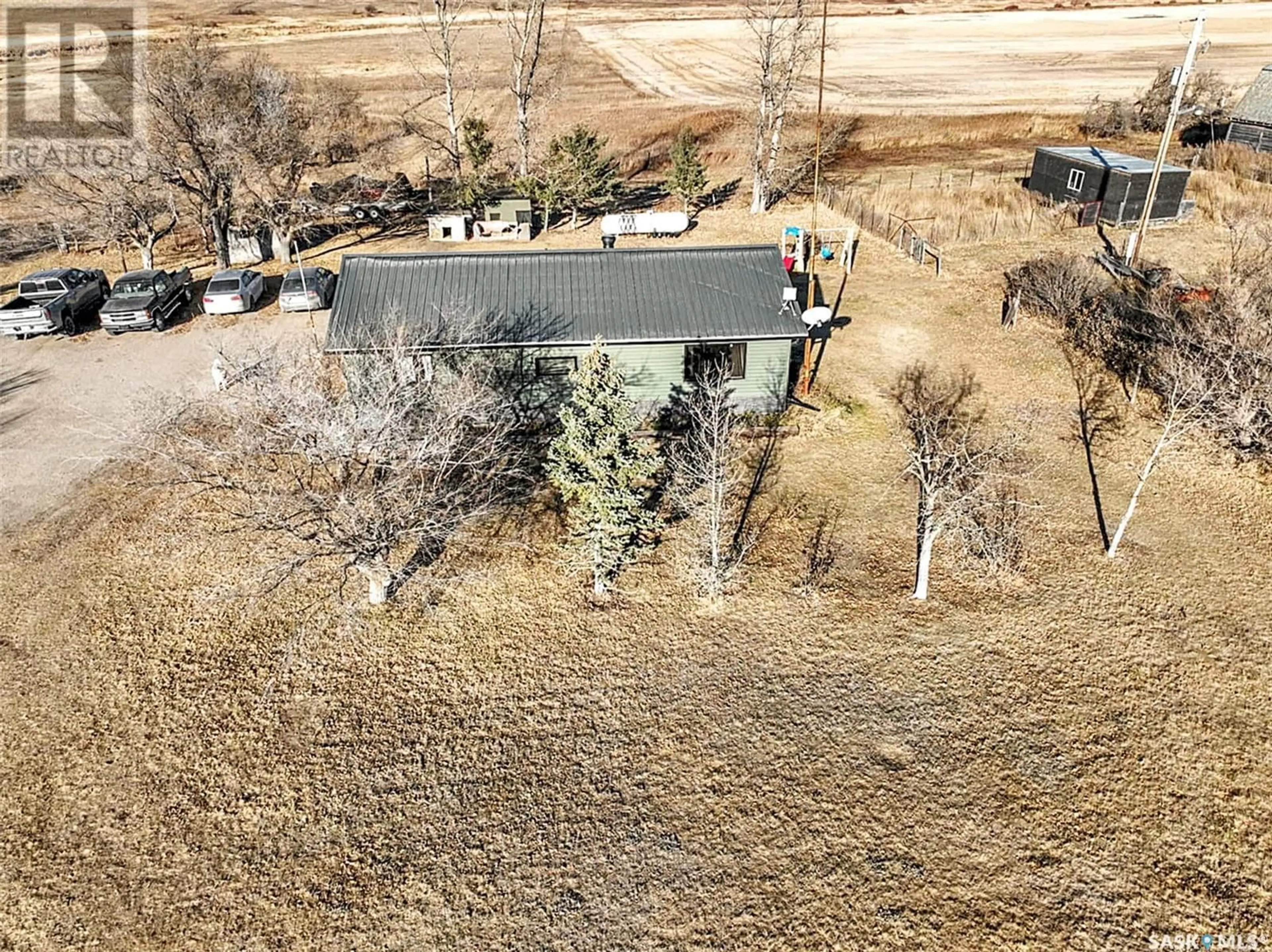 A pic from exterior of the house or condo, the fenced backyard for Grenfell Acres, Elcapo Rm No. 154 Saskatchewan S0G2B0