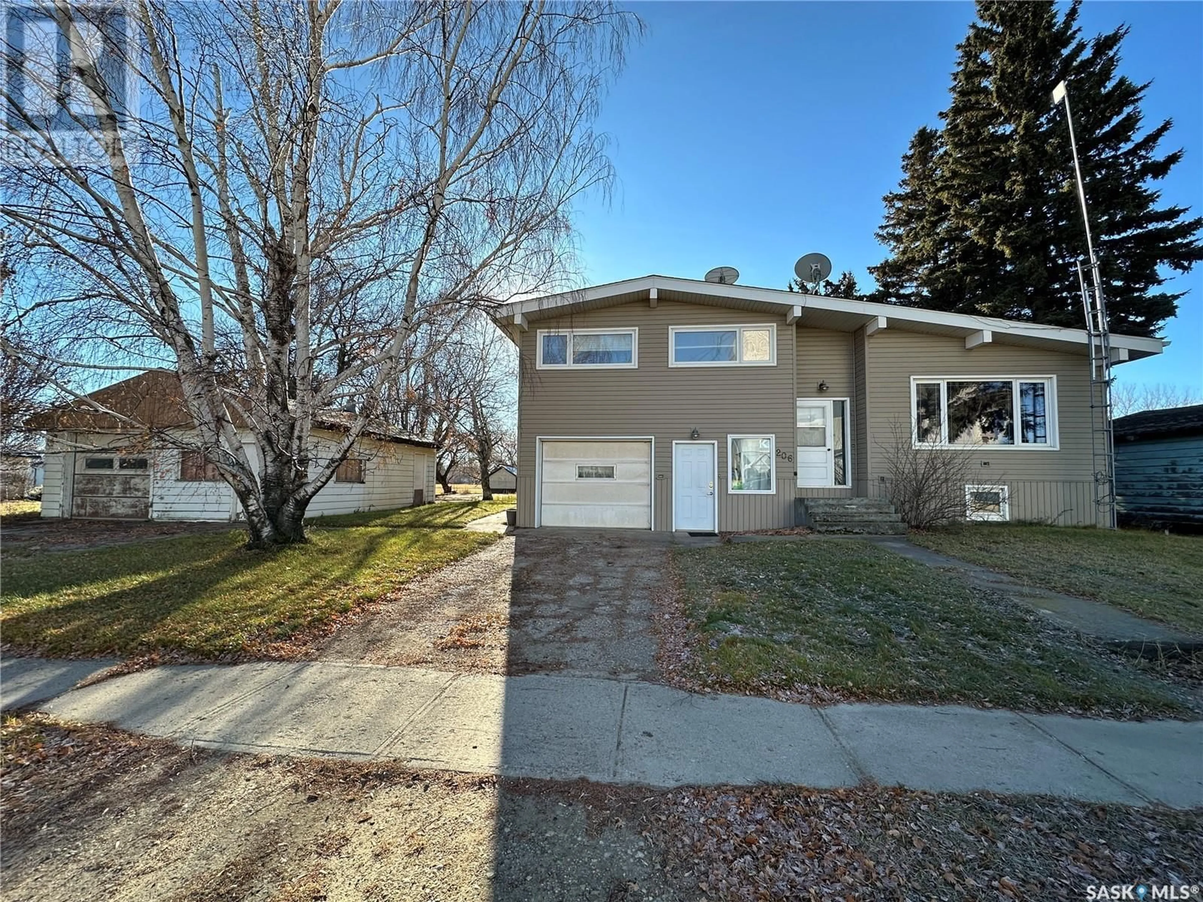 Frontside or backside of a home, the street view for 206 Railway AVENUE, St. Gregor Saskatchewan S0K3X0