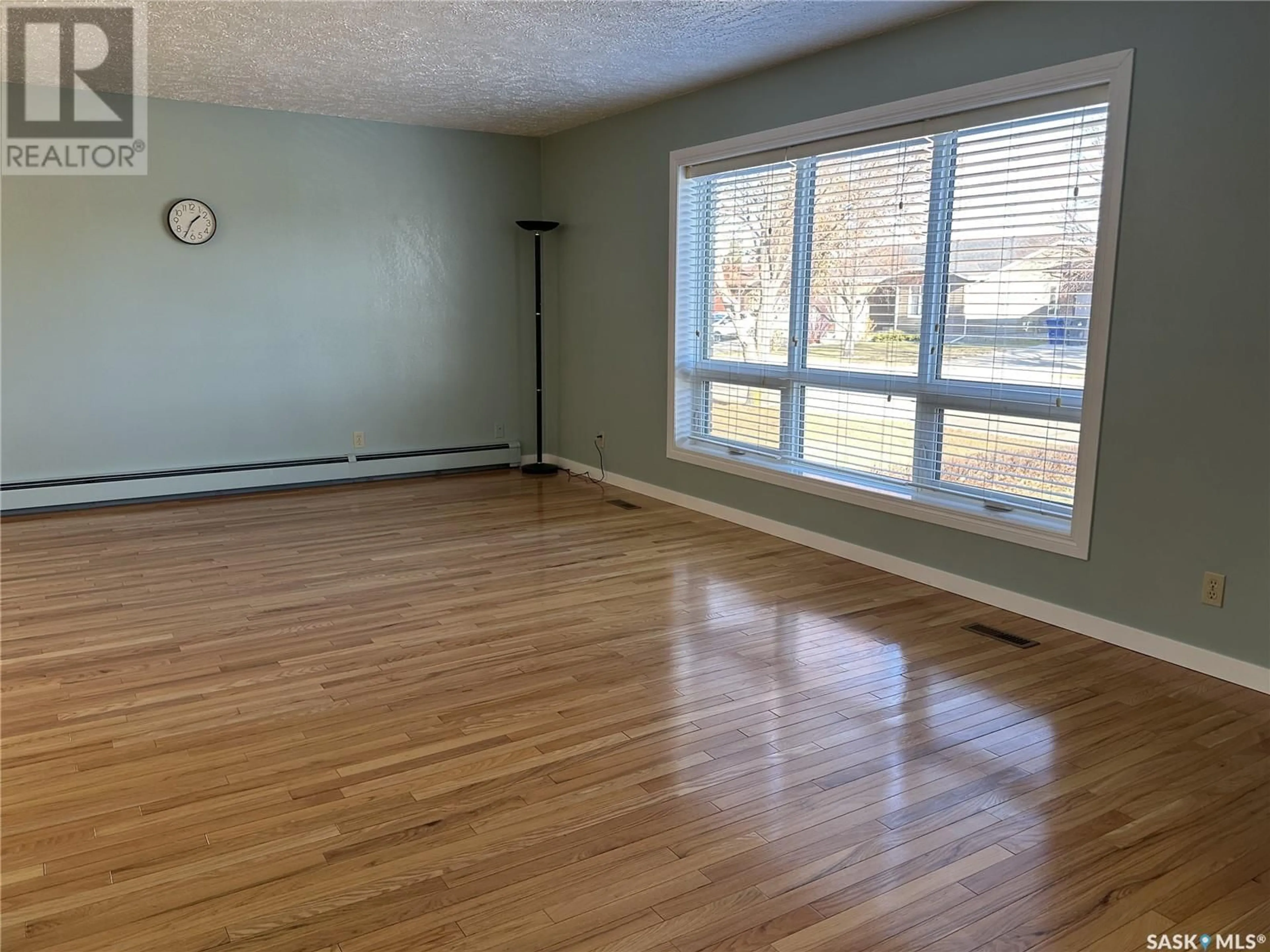 A pic of a room, wood floors for 723 Dieppe DRIVE, Weyburn Saskatchewan S4H3H4