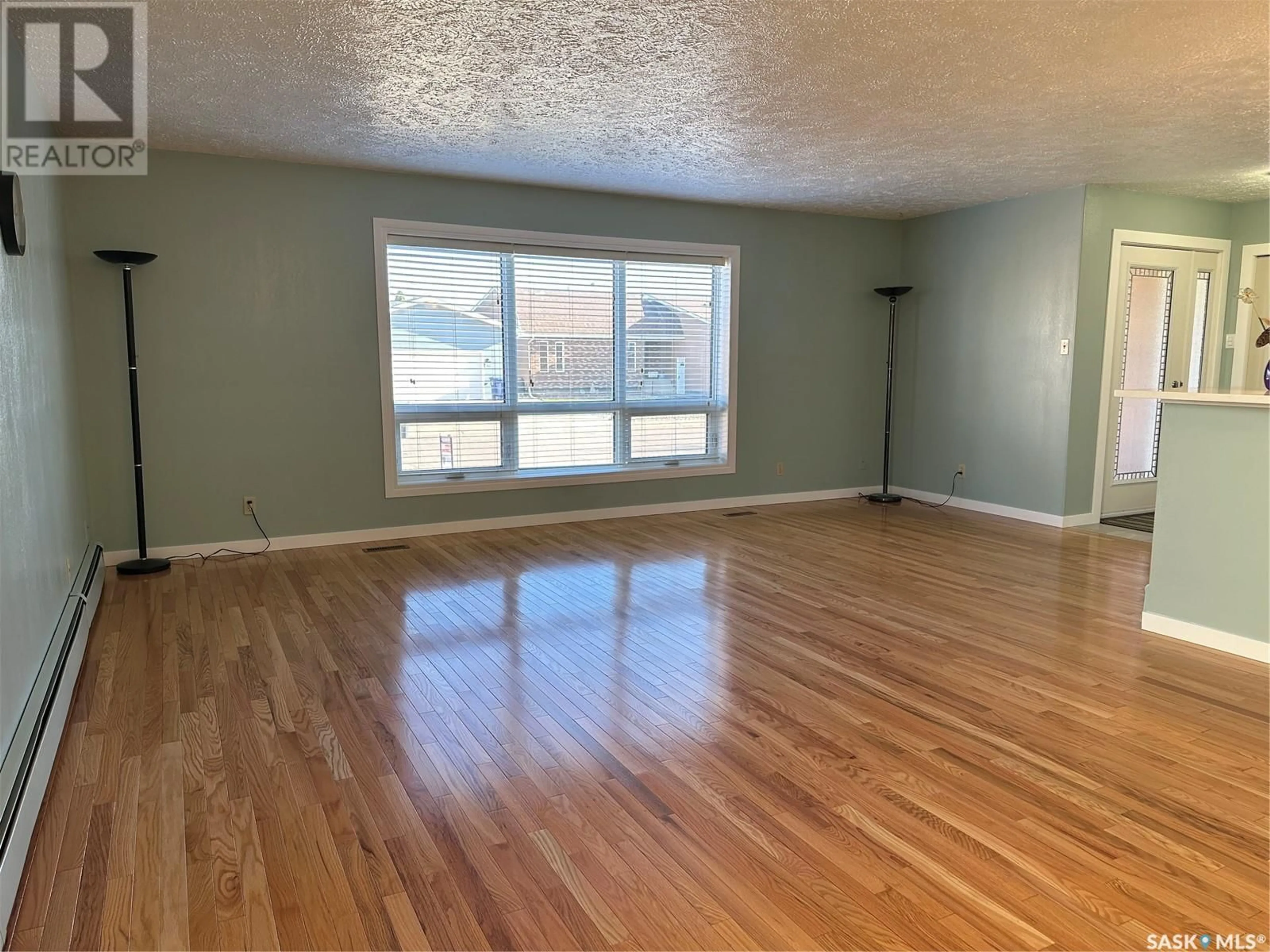 A pic of a room, wood floors for 723 Dieppe DRIVE, Weyburn Saskatchewan S4H3H4