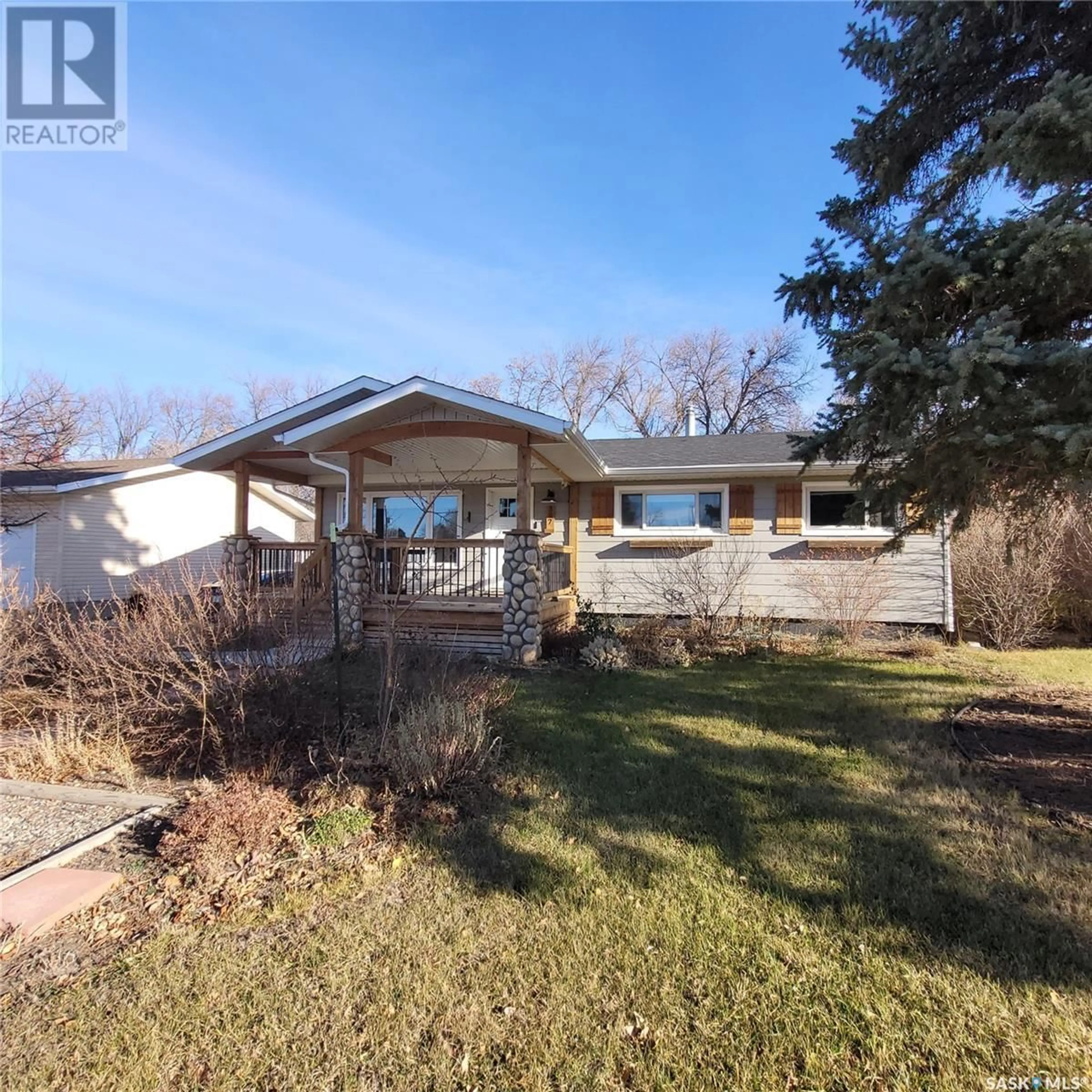 Frontside or backside of a home, the street view for 307 Birch STREET, Caronport Saskatchewan S0H0S0