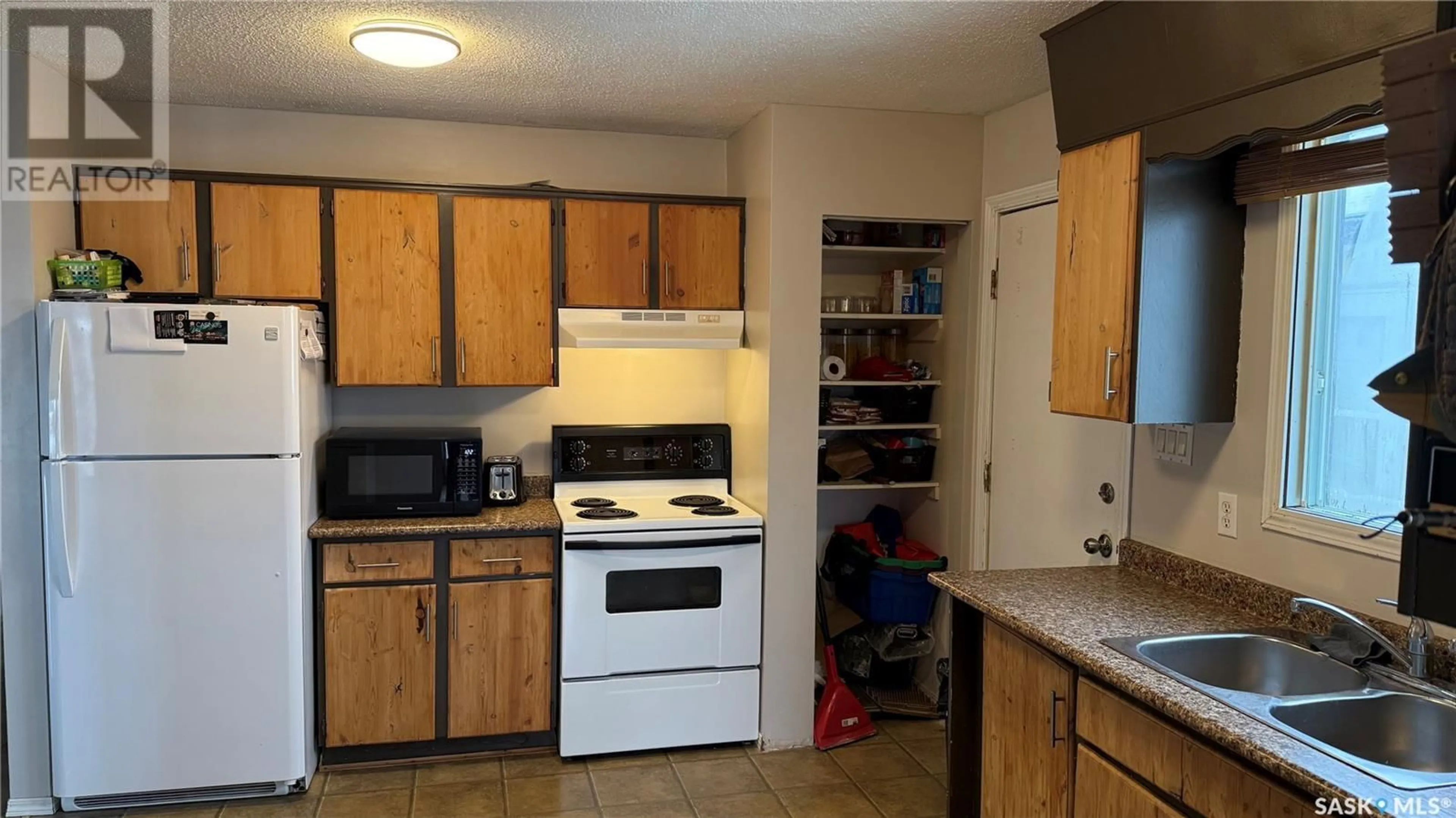 Standard kitchen, unknown floor, cottage for 249 Macdowall CRESCENT, Prince Albert Saskatchewan S6V6N5