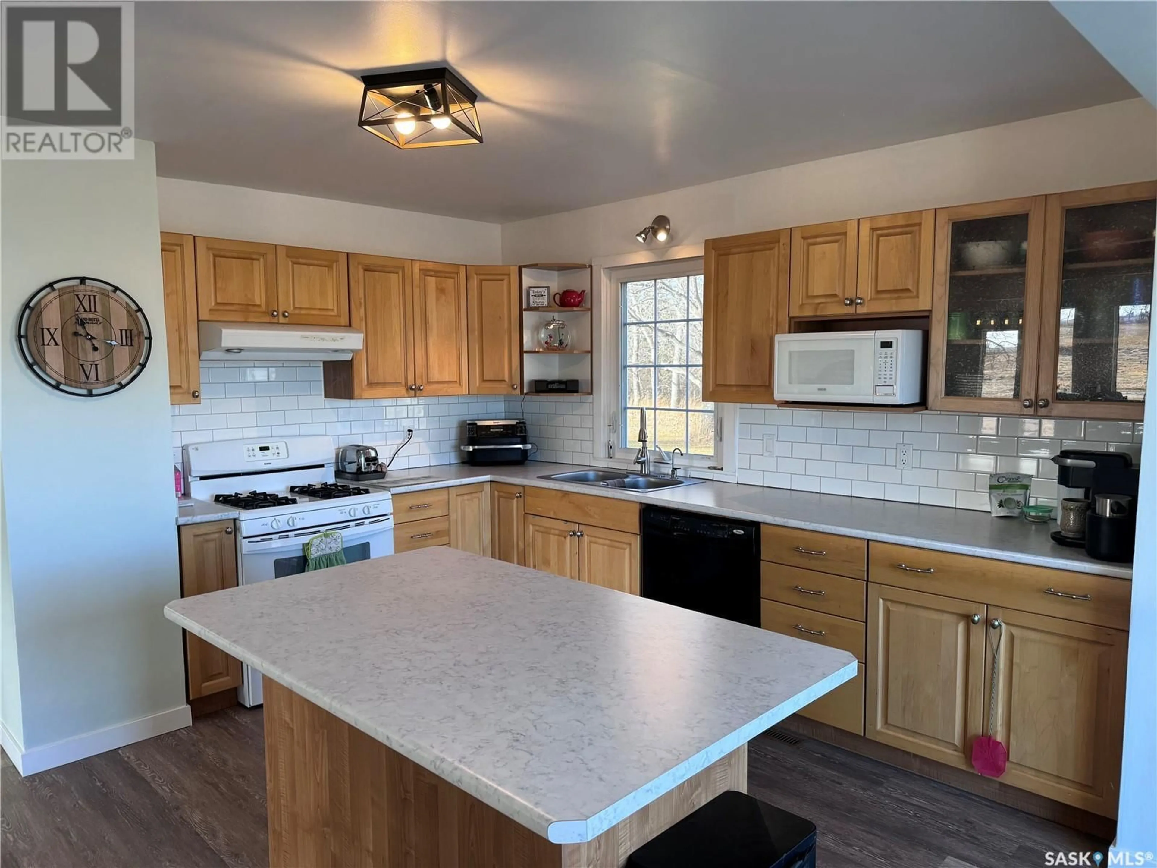 Standard kitchen, wood floors, cottage for Classen Acreage, Spalding Rm No. 368 Saskatchewan S0K4V0