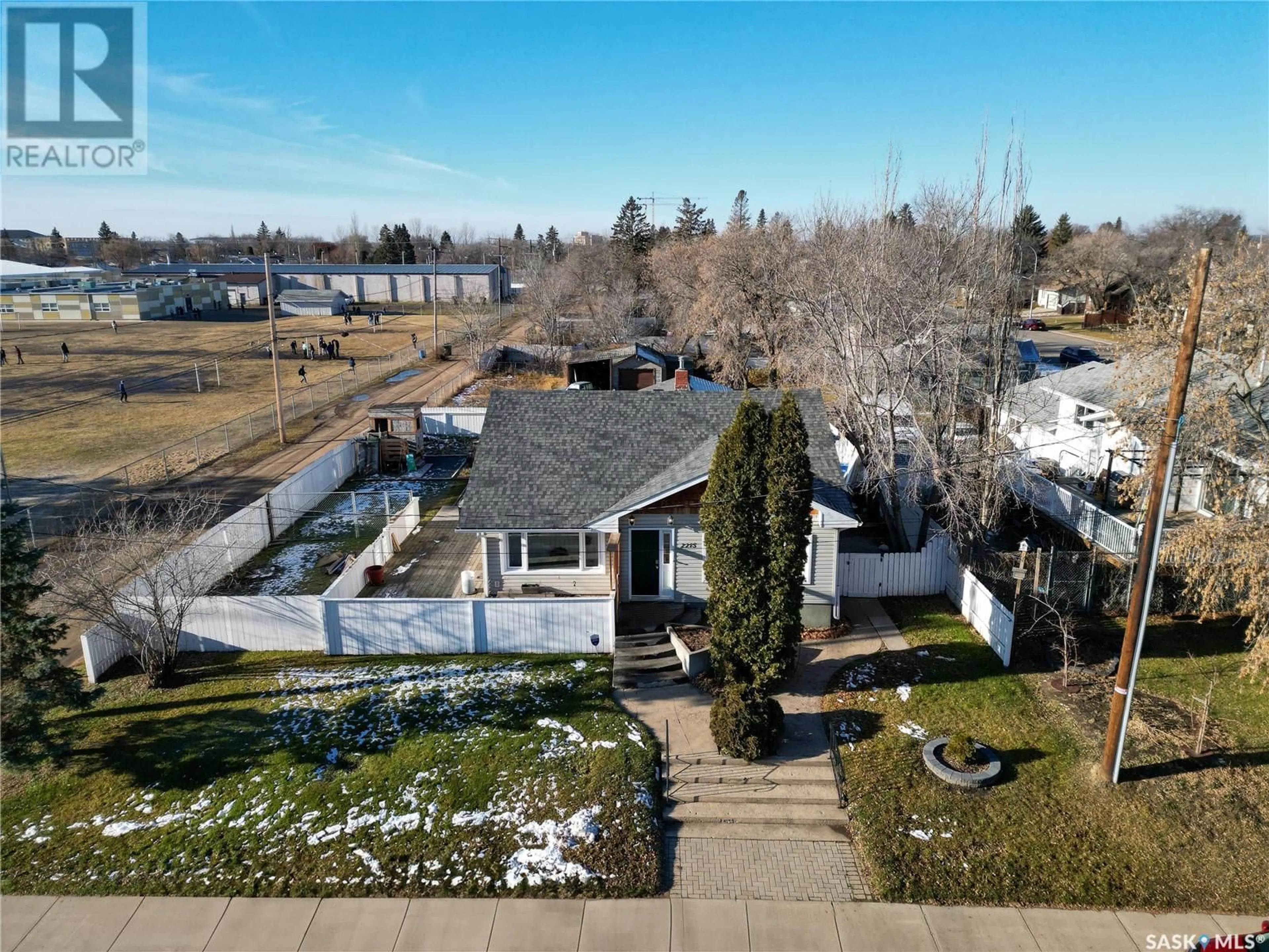 Frontside or backside of a home, the fenced backyard for 2215 5th AVENUE W, Prince Albert Saskatchewan S6V5J3