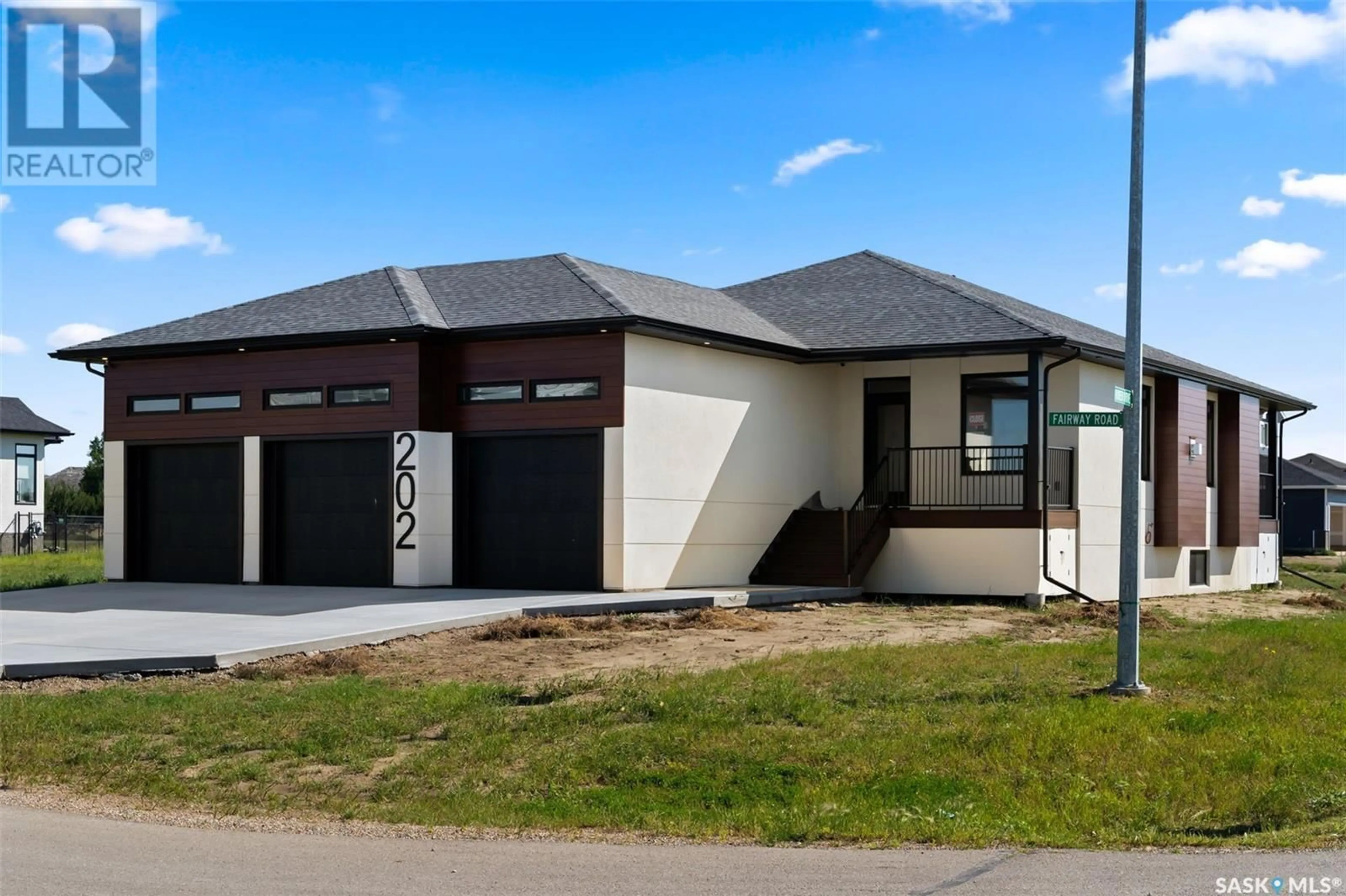 Frontside or backside of a home, cottage for 202 Fairway ROAD, Emerald Park Saskatchewan S4L1C8