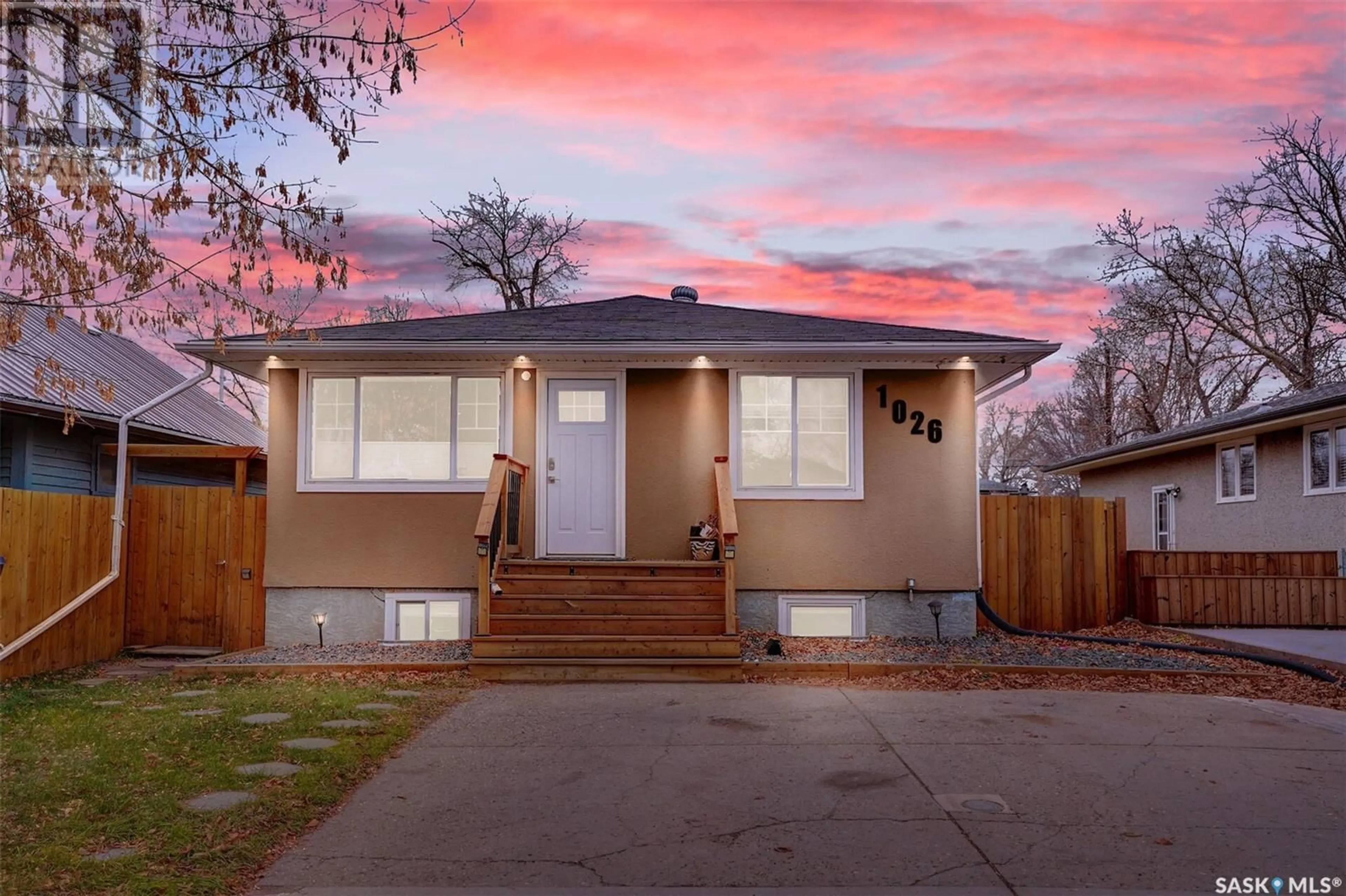 Frontside or backside of a home, the fenced backyard for 1026 Broder STREET, Regina Saskatchewan S4N3P7