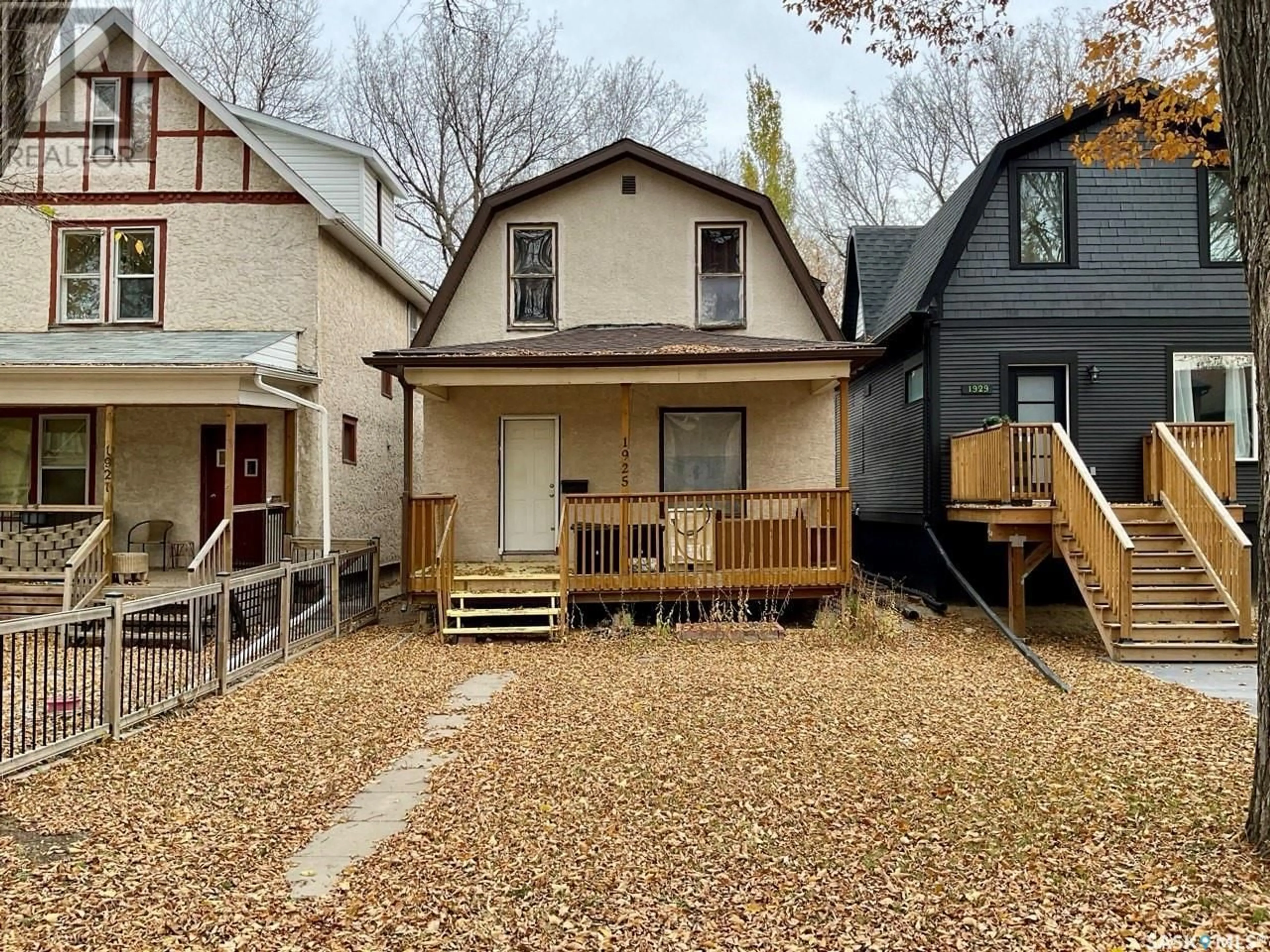 Frontside or backside of a home, the fenced backyard for 1925 Robinson STREET, Regina Saskatchewan S4T2P4