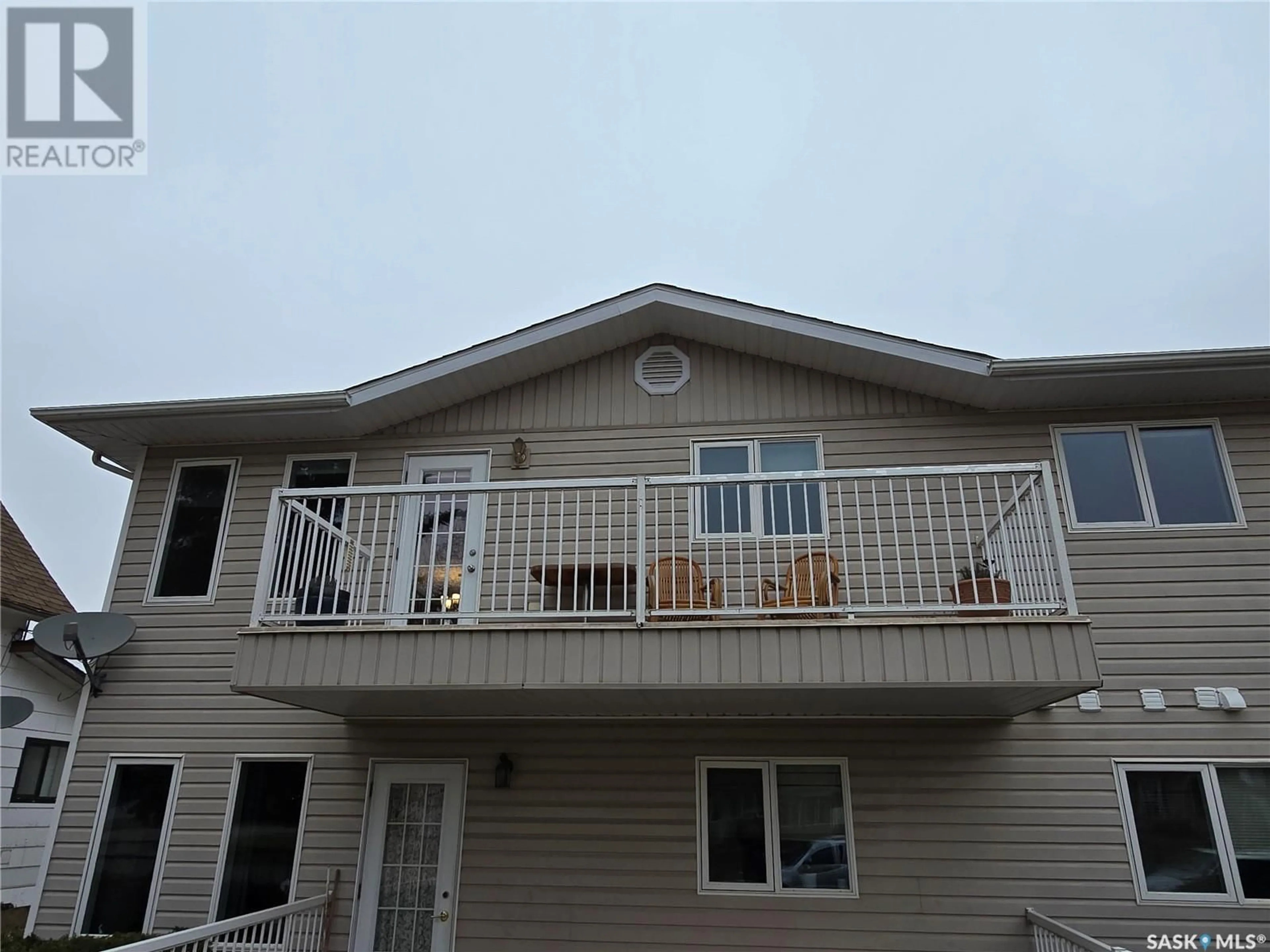 Home with vinyl exterior material, building for E - 202 304 3RD AVENUE, Watrous Saskatchewan S0K4T0