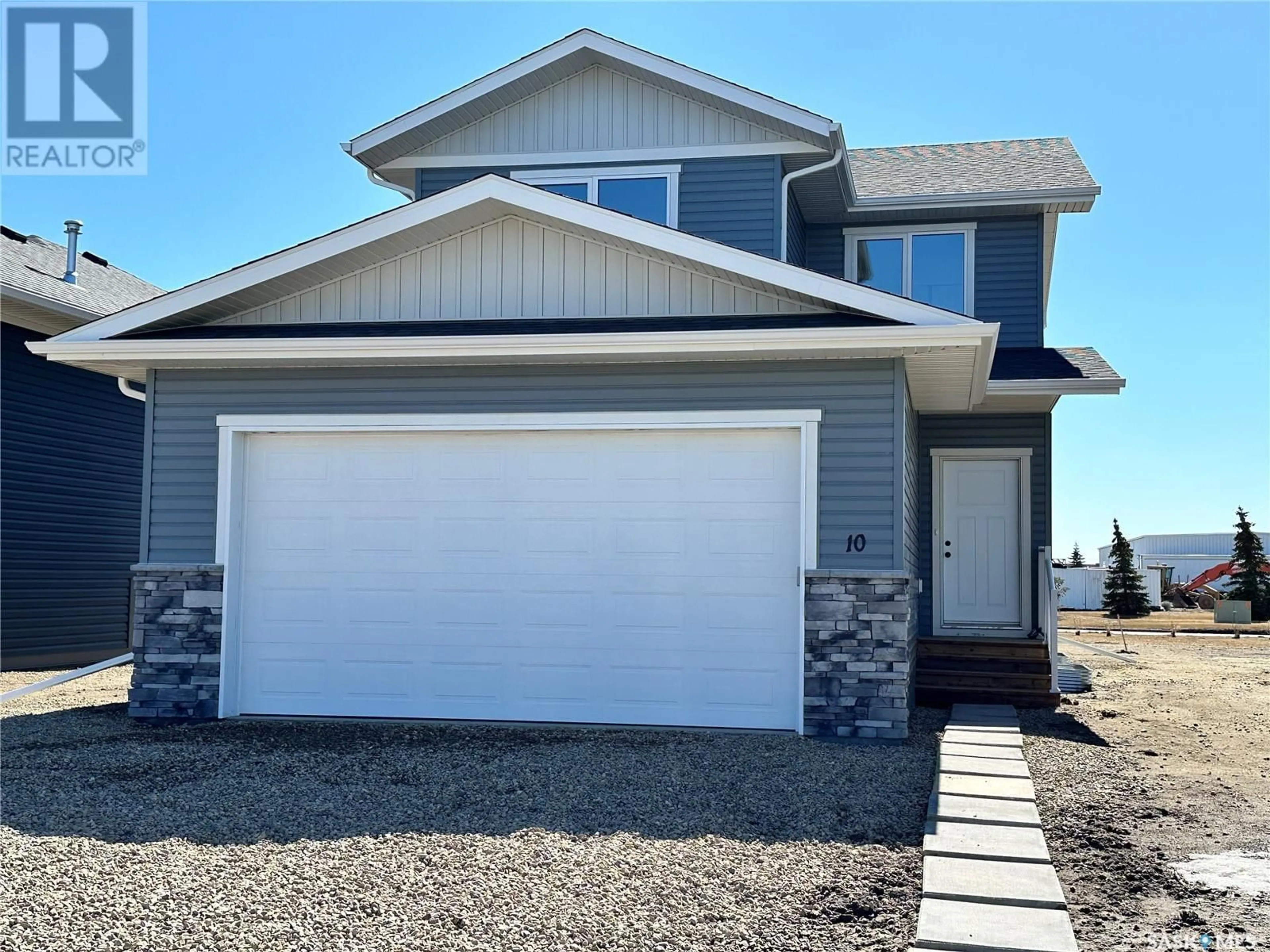 Home with vinyl exterior material for 10 Aspen PLACE, Humboldt Saskatchewan S0K2A0