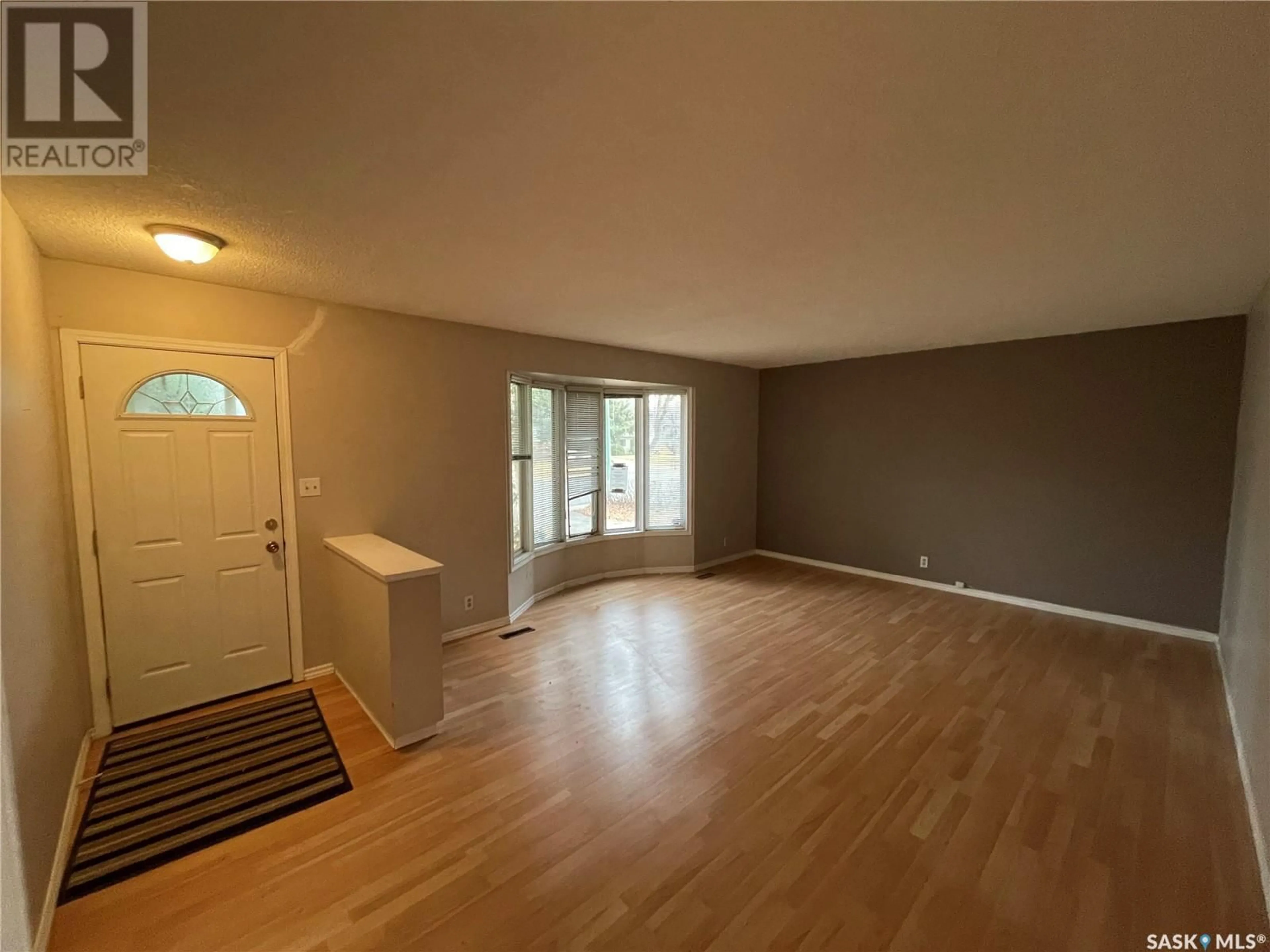 A pic of a room, wood floors for 30 IRVIN CRESCENT, Regina Saskatchewan S4R5L2