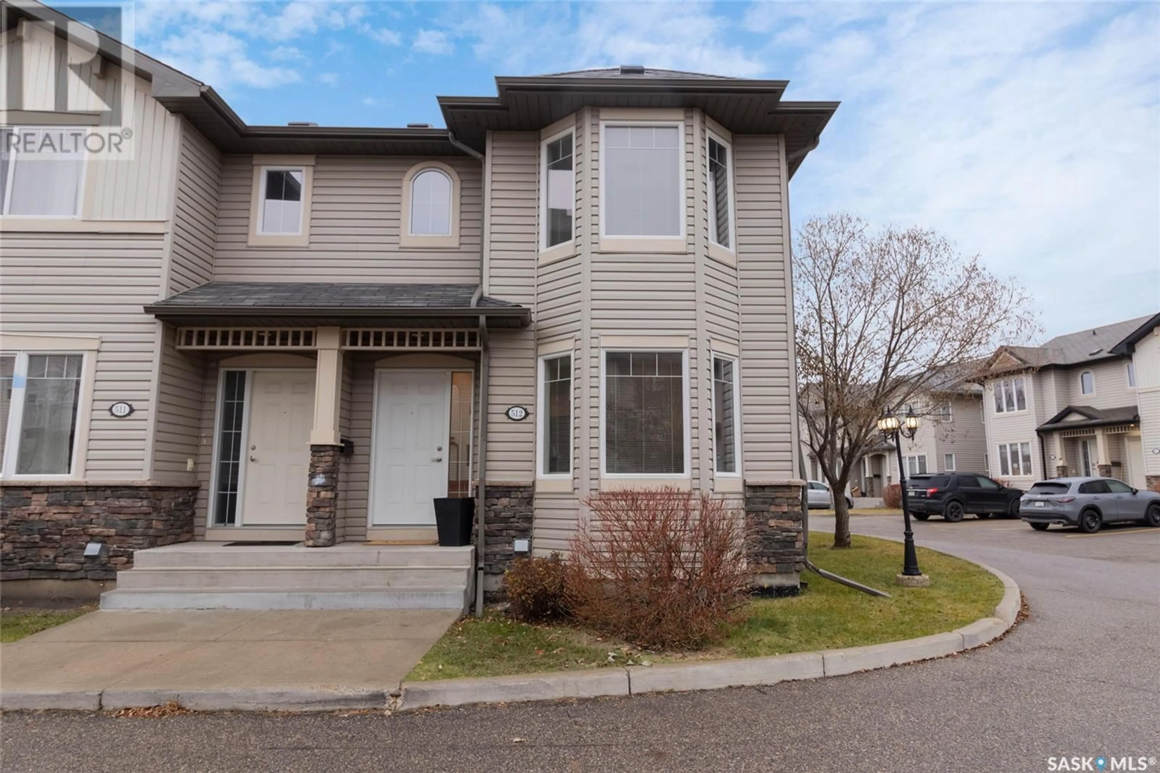 A pic from exterior of the house or condo, the street view for 512 303 Slimmon PLACE, Saskatoon Saskatchewan S7V0A8