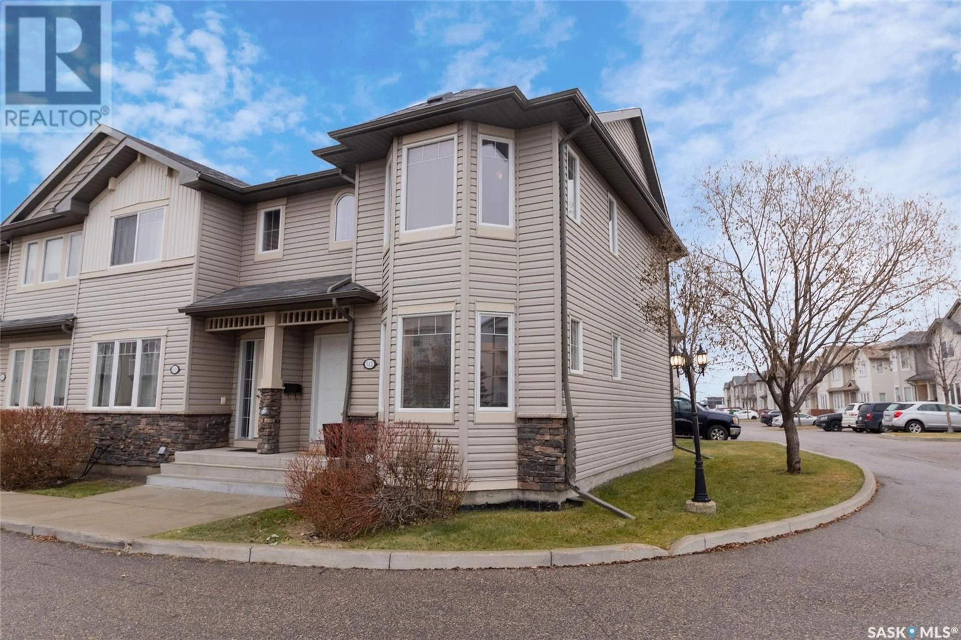 A pic from exterior of the house or condo, the street view for 512 303 Slimmon PLACE, Saskatoon Saskatchewan S7V0A8