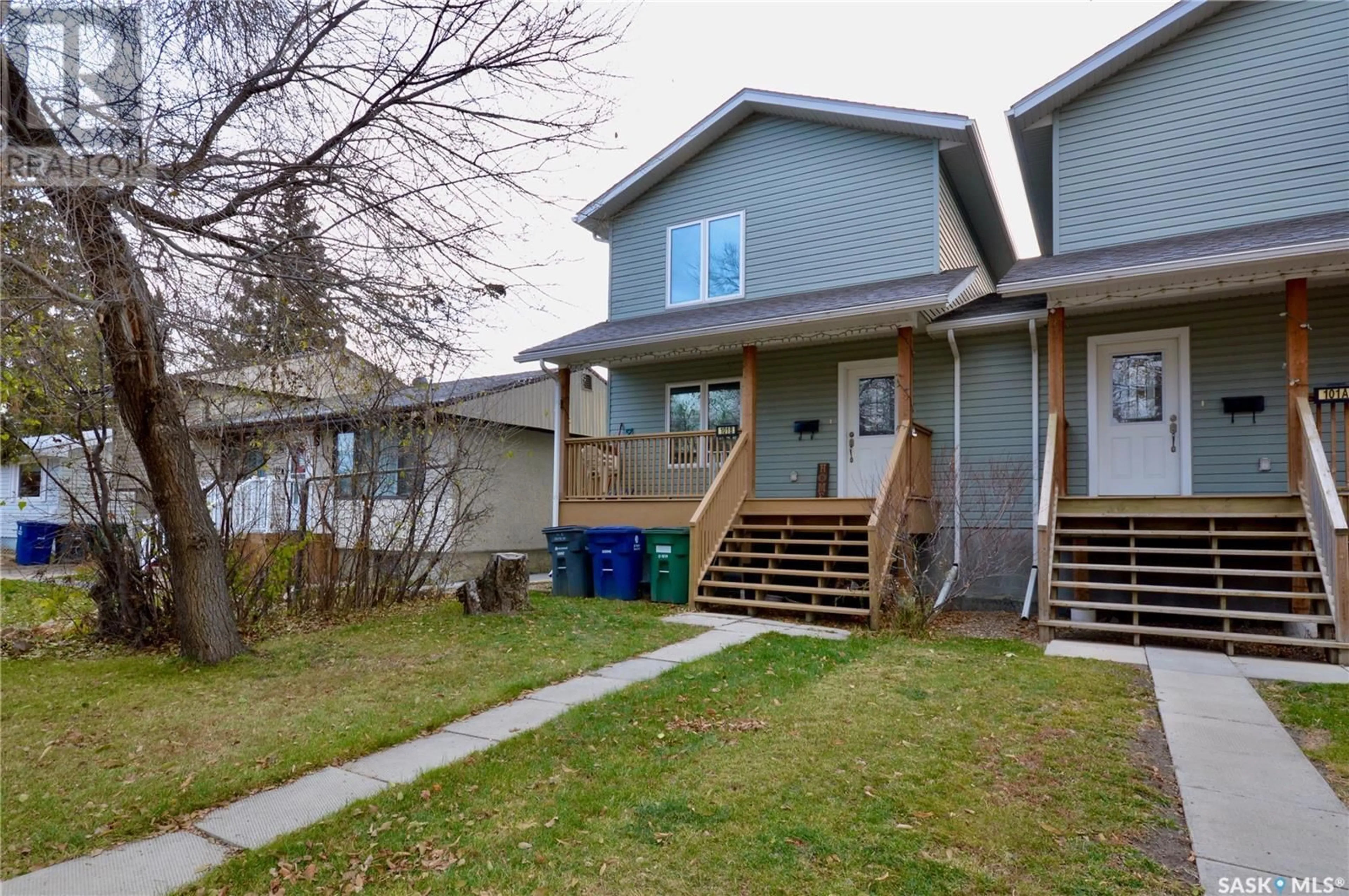 A pic from exterior of the house or condo, the fenced backyard for 101B Cruise STREET, Saskatoon Saskatchewan S7N2C2