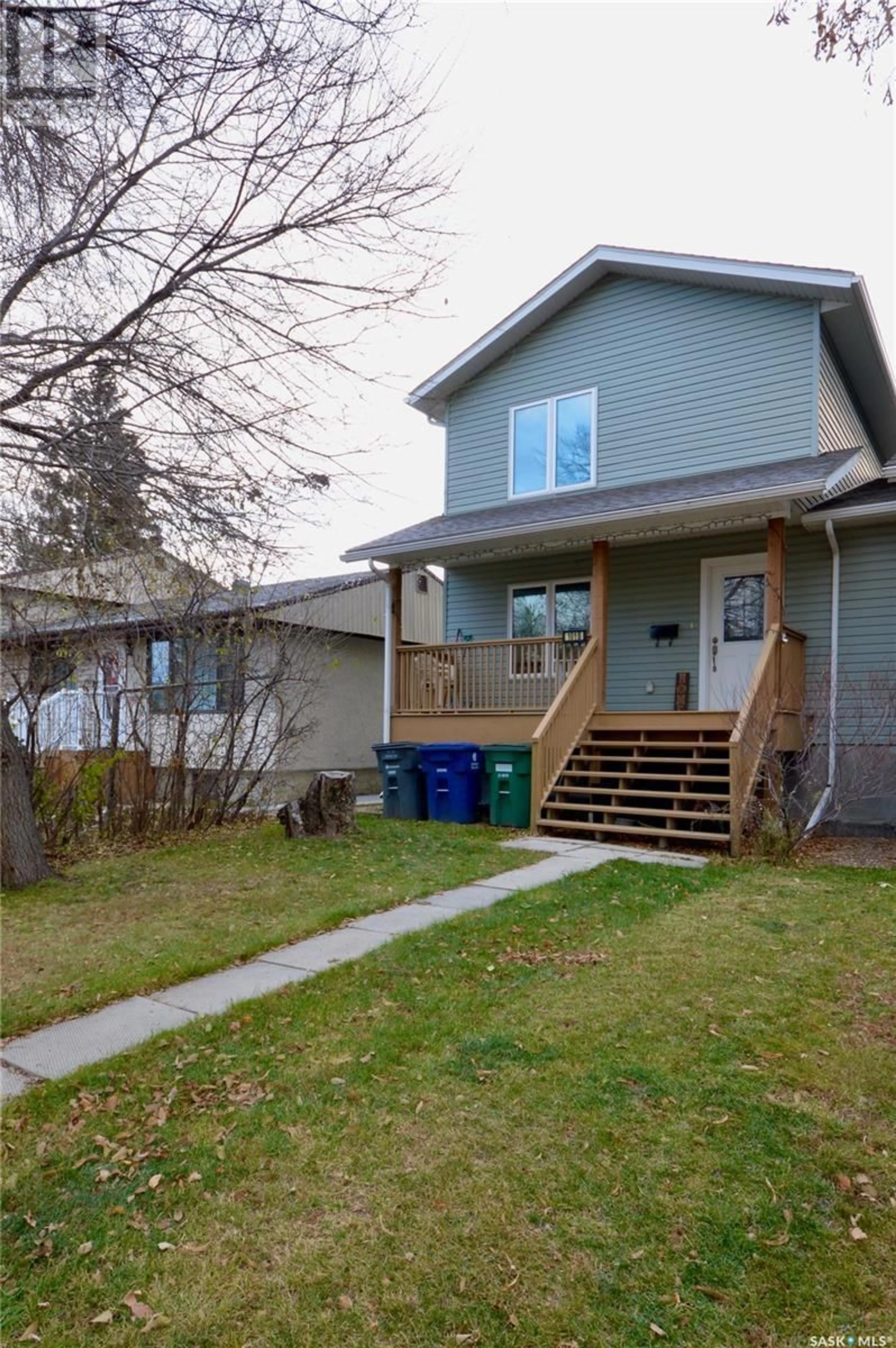 Frontside or backside of a home, the fenced backyard for 101B Cruise STREET, Saskatoon Saskatchewan S7N2C2