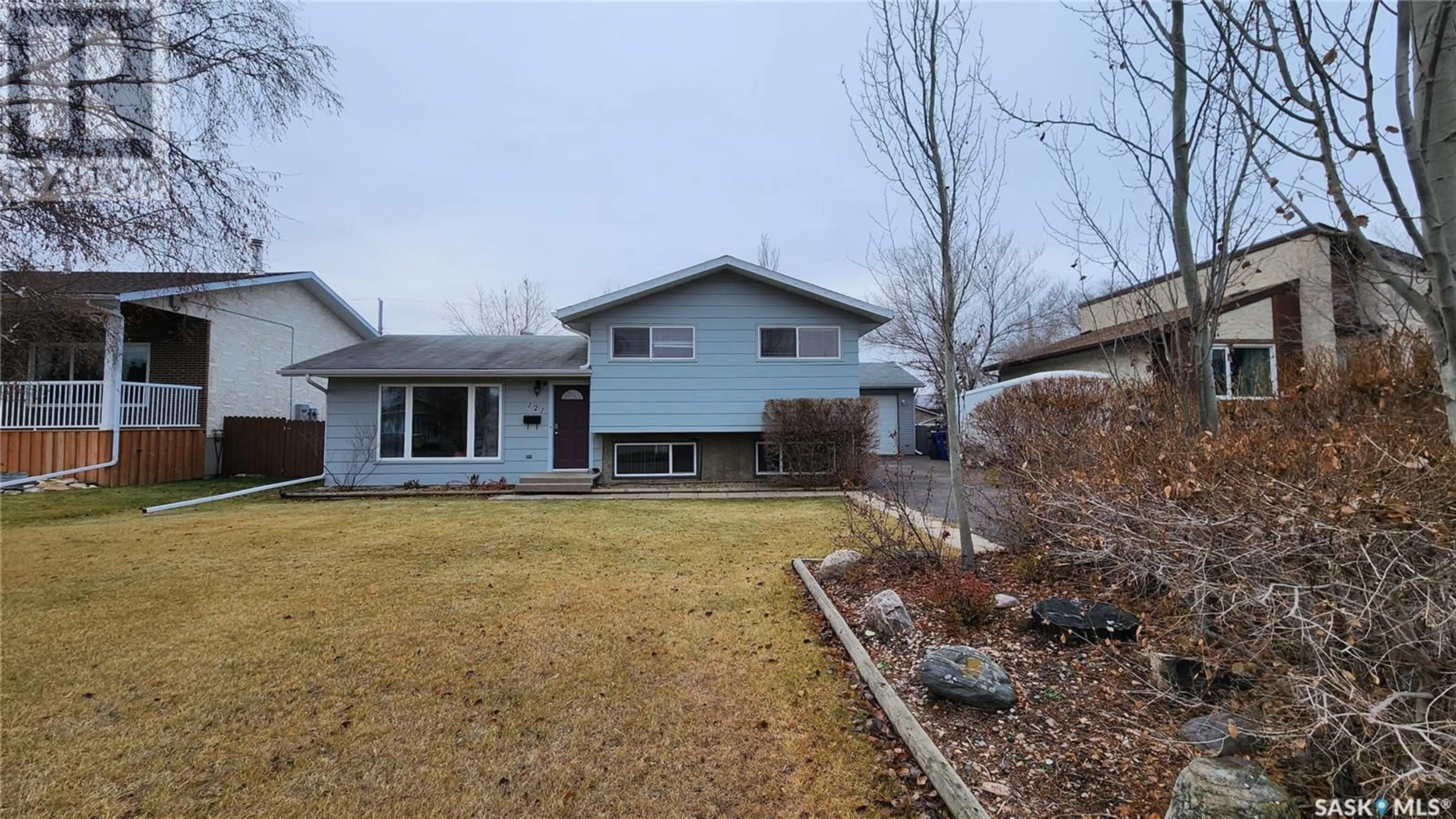 Frontside or backside of a home, the fenced backyard for 121 19th STREET, Battleford Saskatchewan S0M0E0