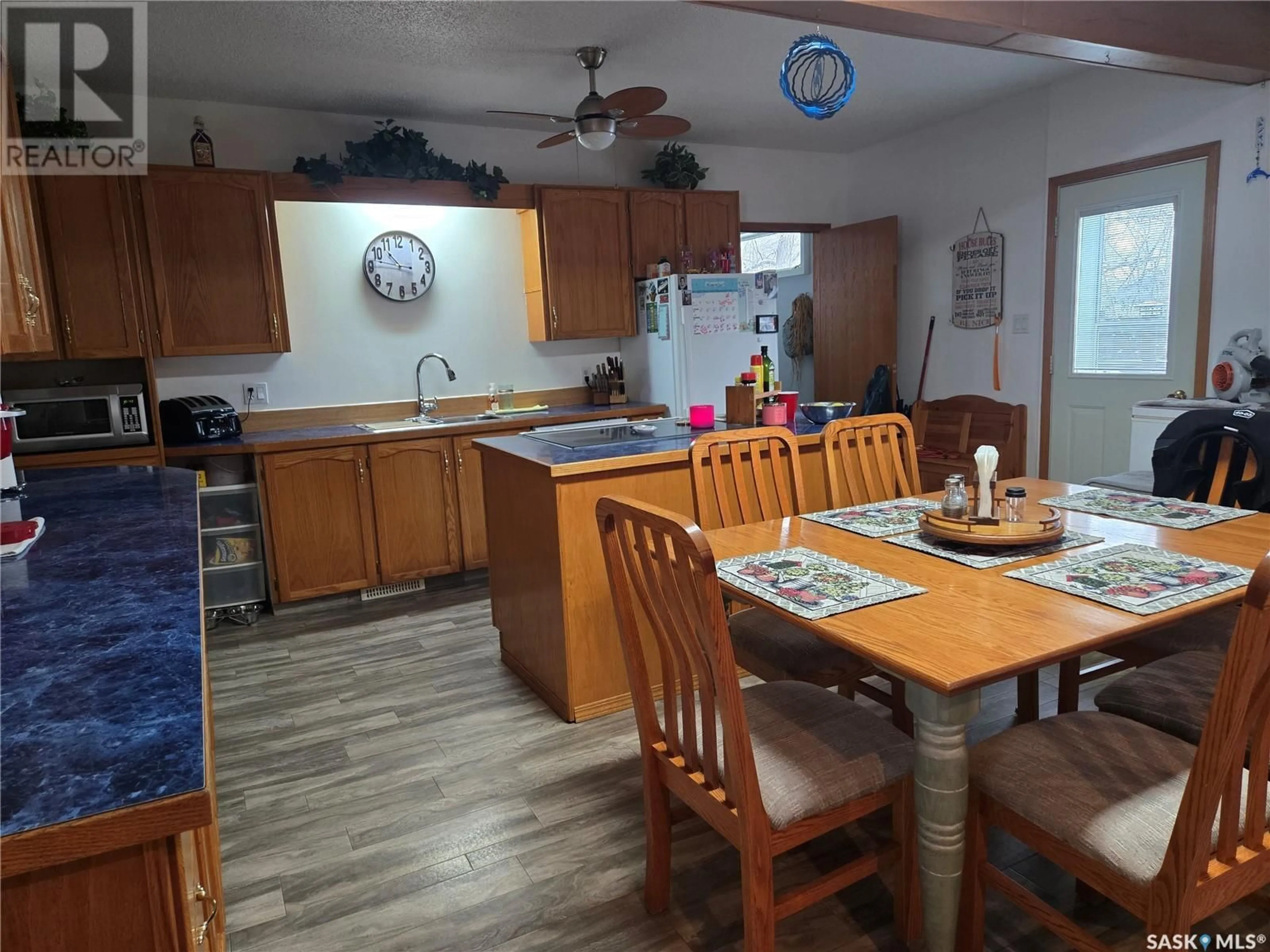 Open concept kitchen for 358 Prince Edward STREET, Melville Saskatchewan S0A2P0