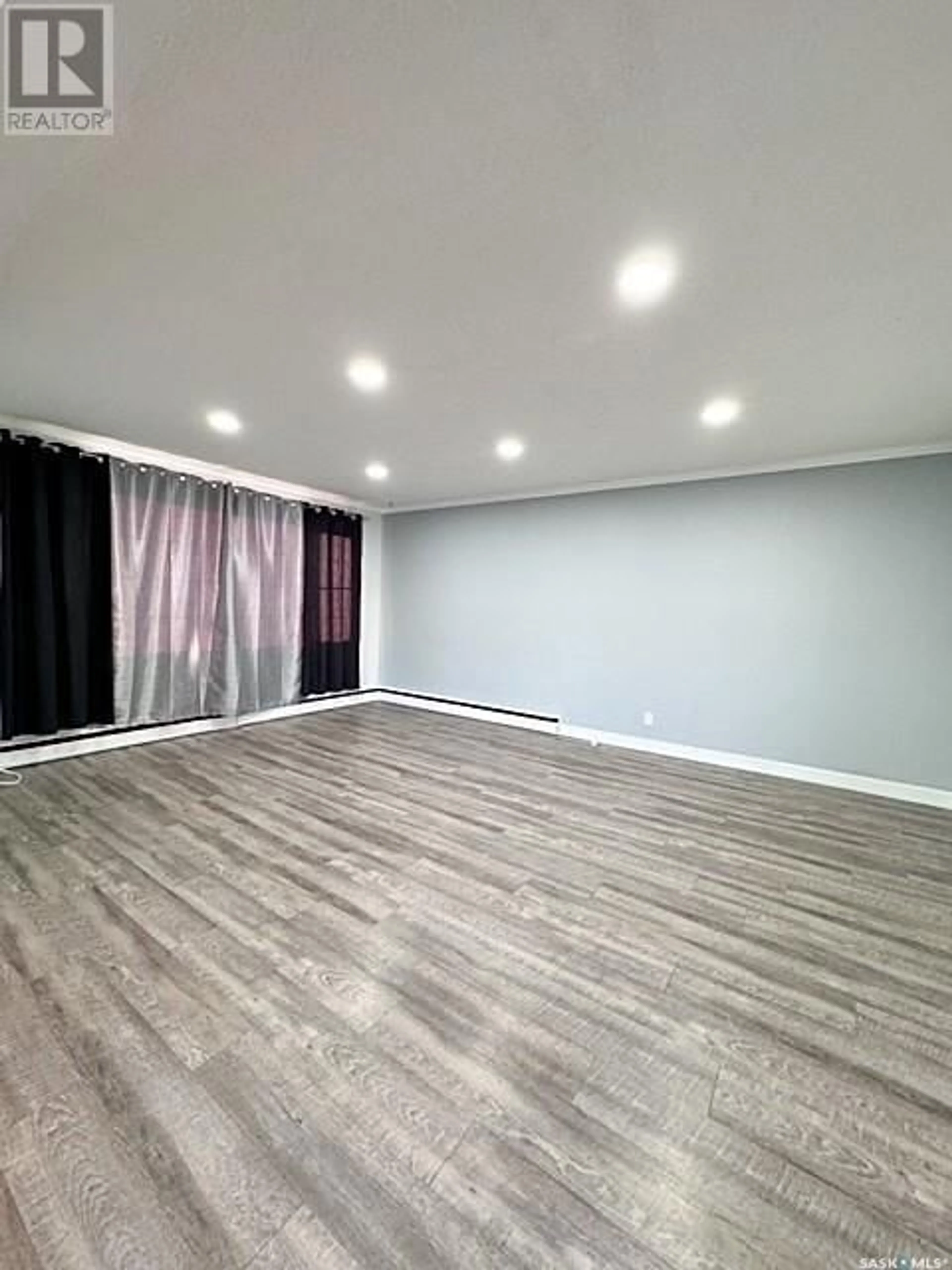 A pic of a room, wood floors for 491 2nd AVENUE SE, Swift Current Saskatchewan S9H3J7