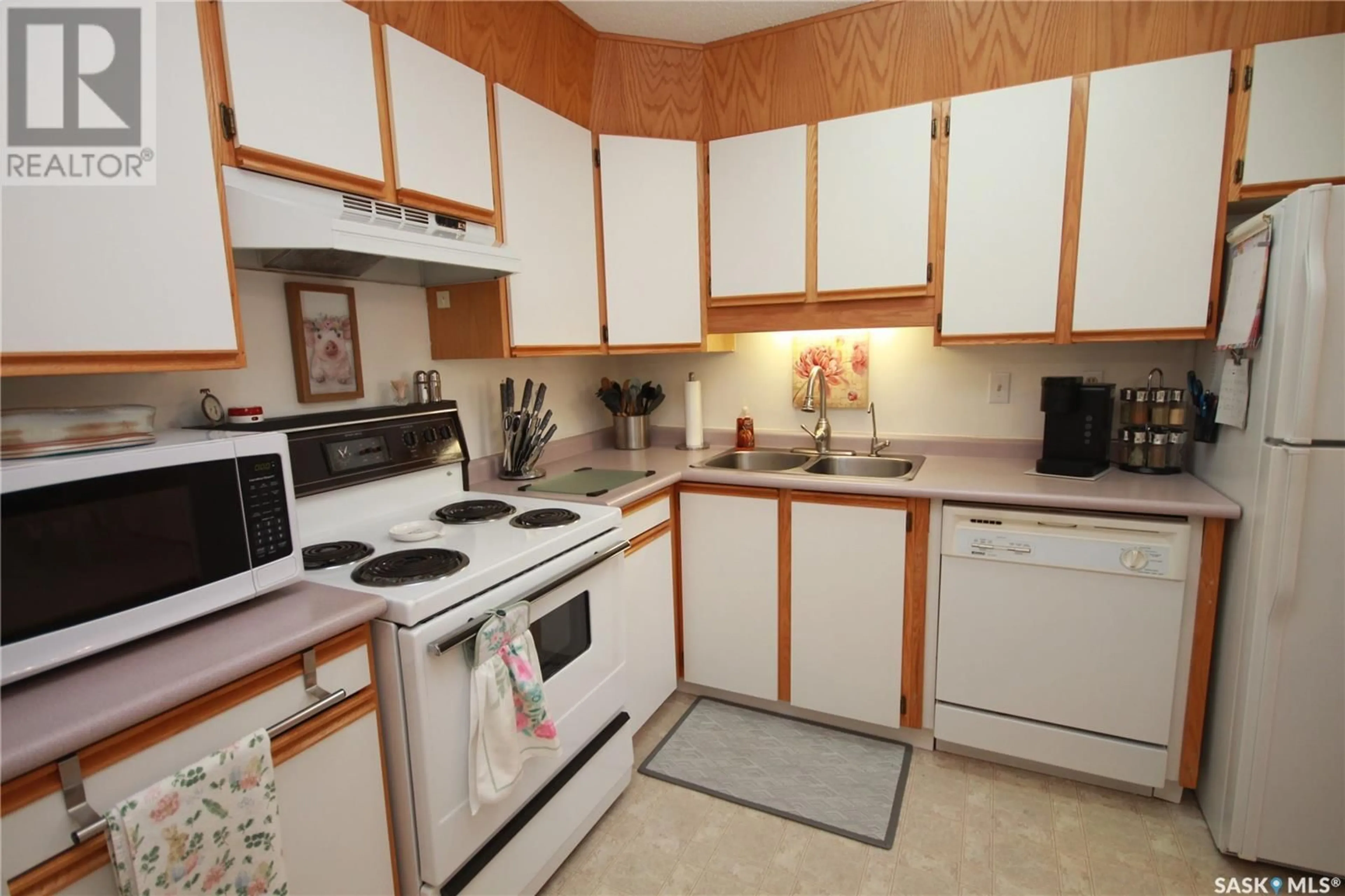 Standard kitchen, carpet floors, cottage for 201 1002 108th STREET, North Battleford Saskatchewan S9A2A9