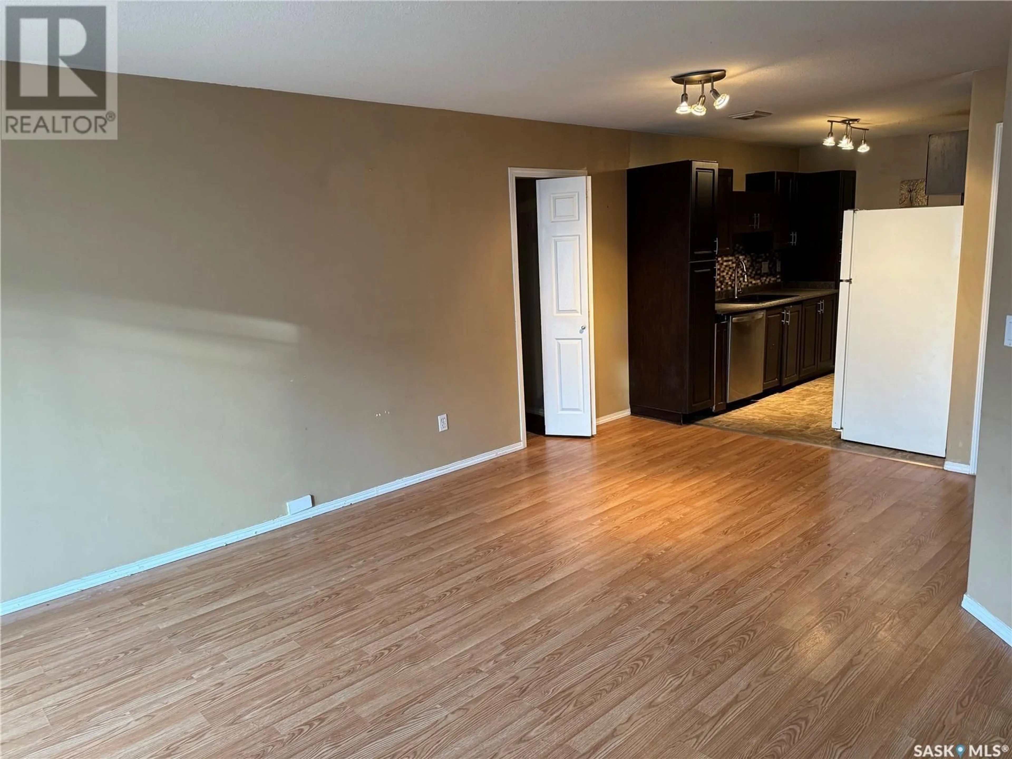 A pic of a room, wood floors for 105G 141 105th STREET W, Saskatoon Saskatchewan S7N1N3