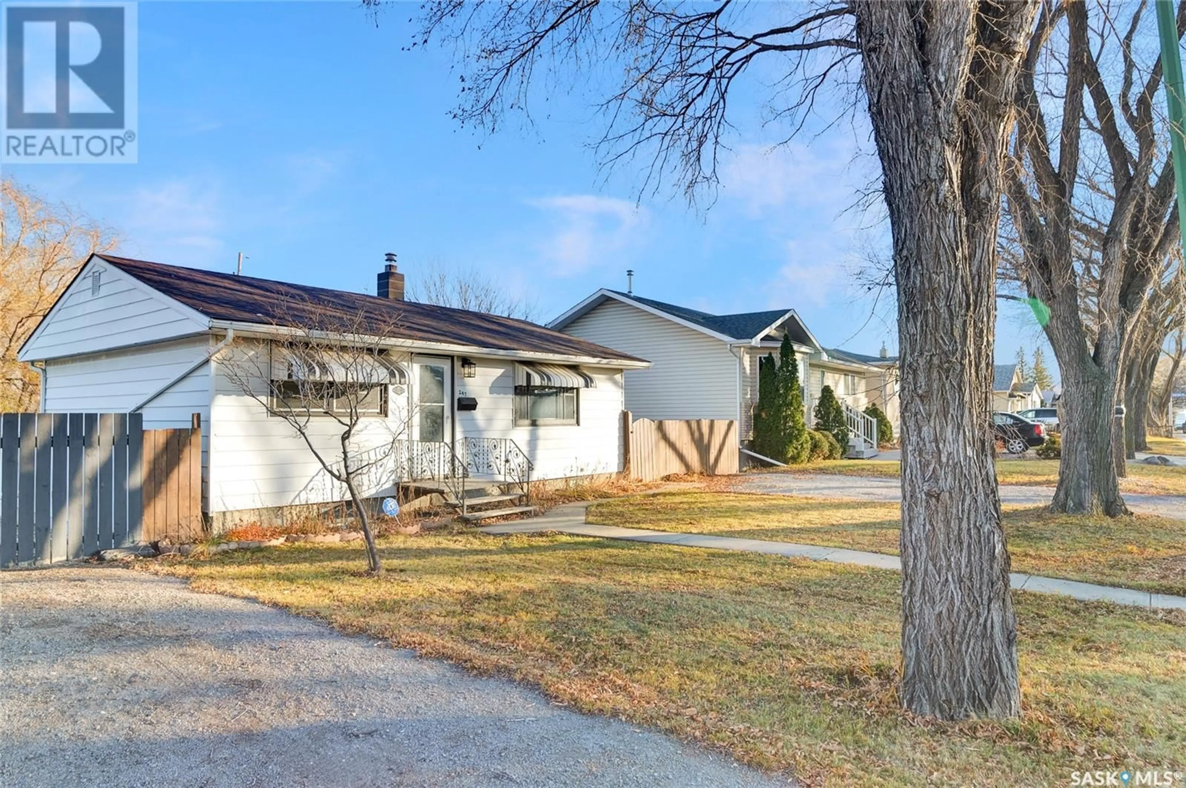 A pic from exterior of the house or condo, the fenced backyard for 247 Smith STREET, Regina Saskatchewan S4R2K8