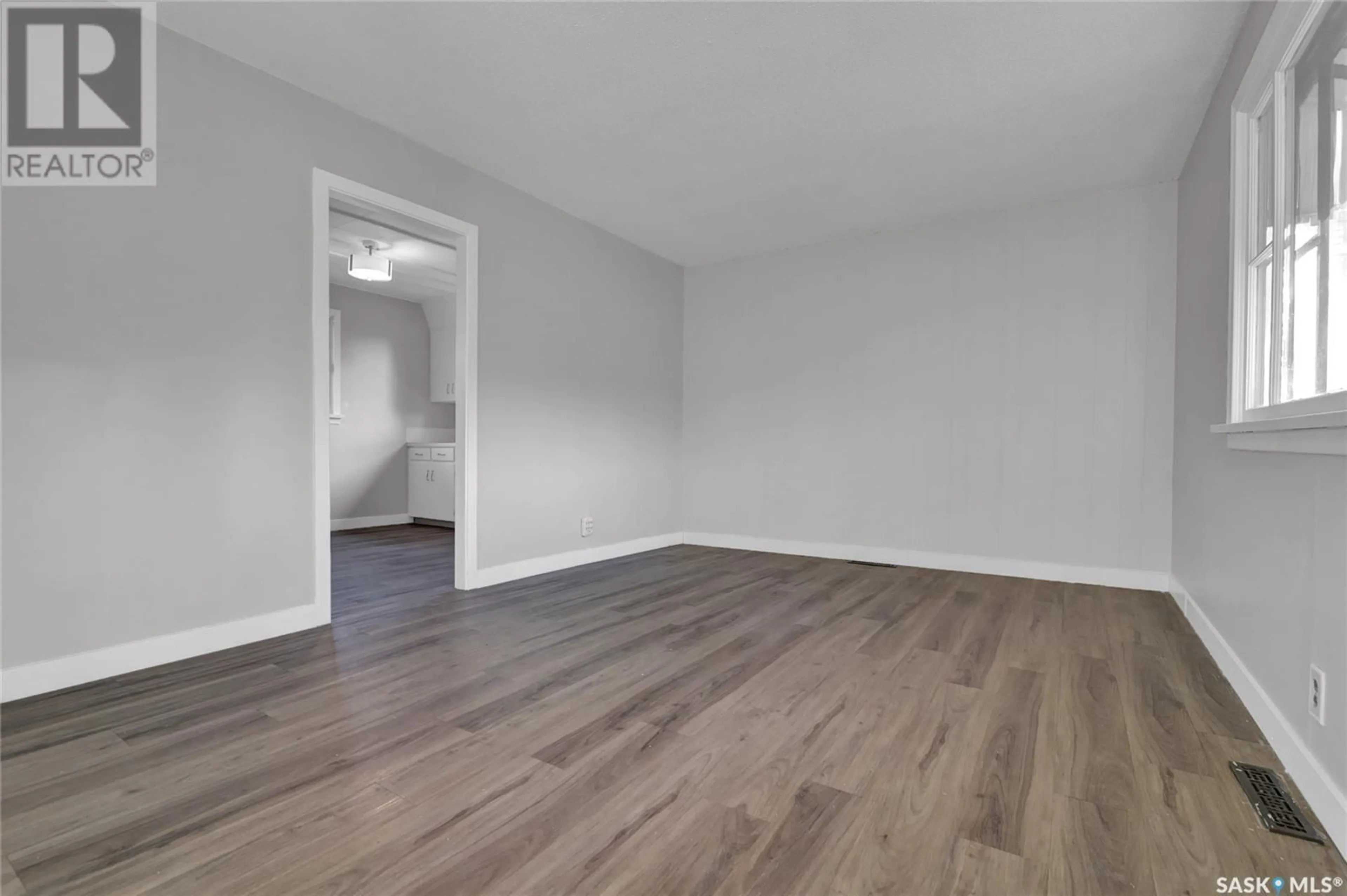 A pic of a room, wood floors for 247 Smith STREET, Regina Saskatchewan S4R2K8