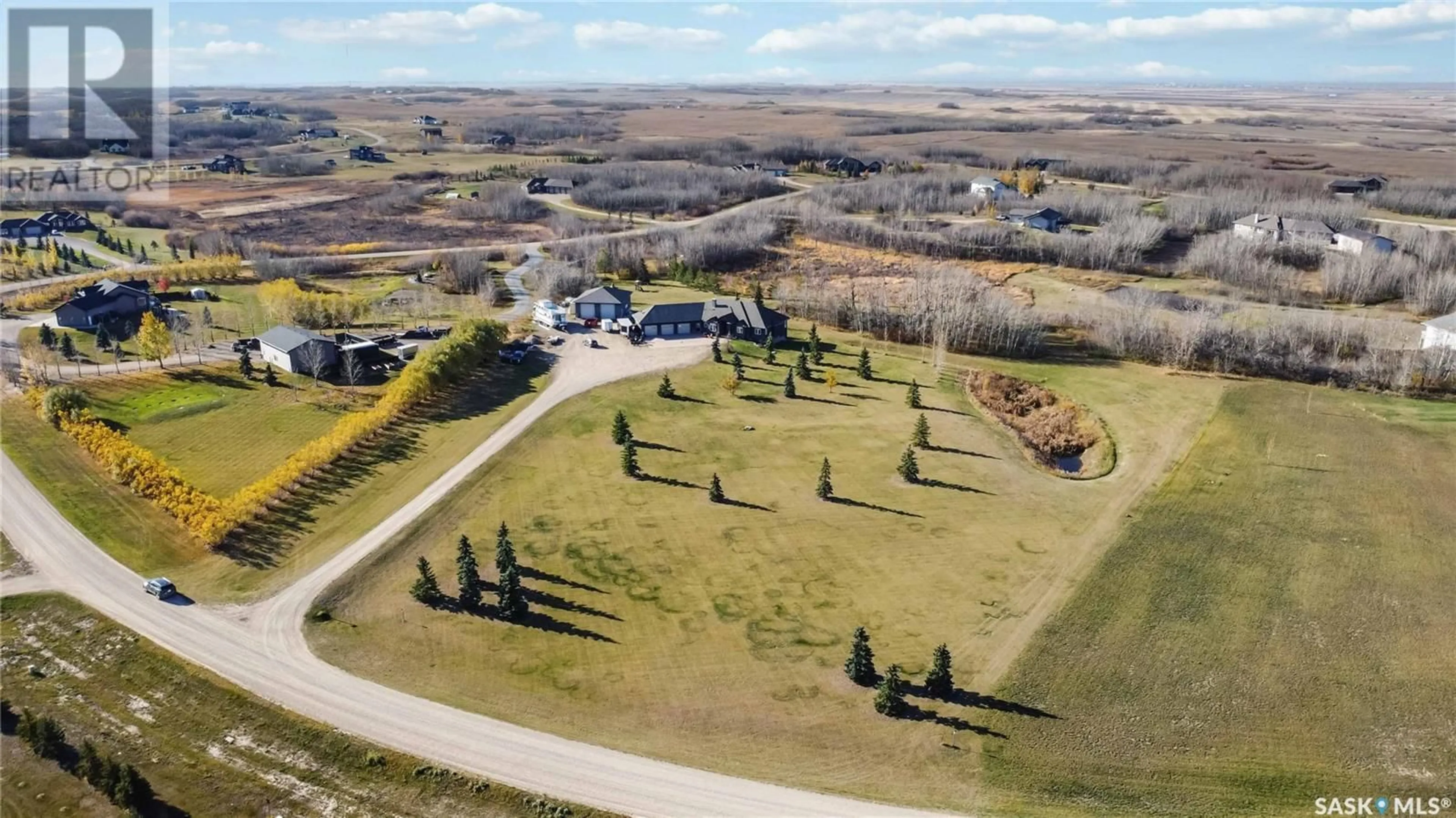 A pic from exterior of the house or condo, the fenced backyard for 106 Mission RIDGE, Aberdeen Rm No. 373 Saskatchewan S7A0A5