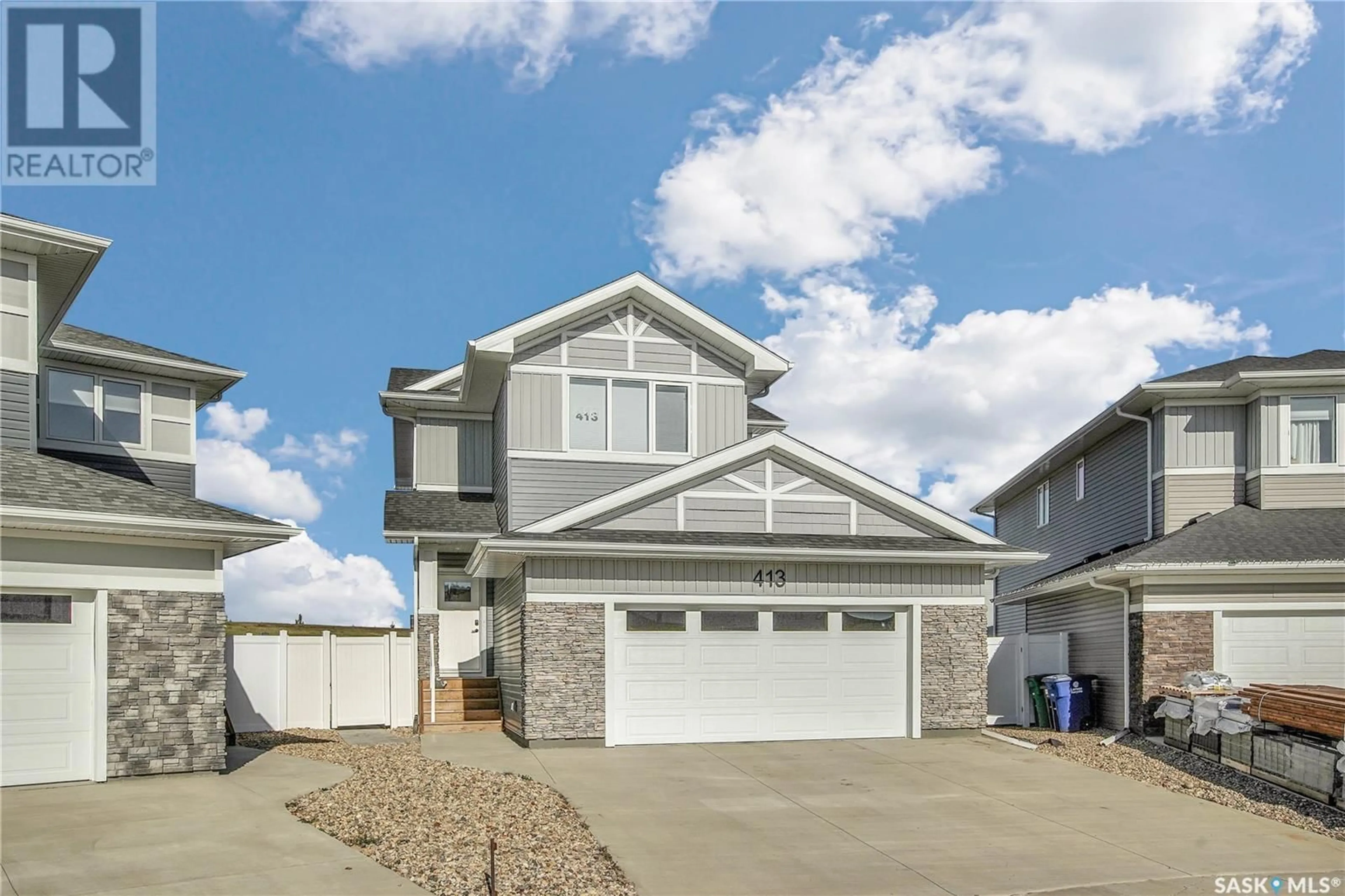 Frontside or backside of a home, the street view for 413 Germain MANOR, Saskatoon Saskatchewan S7V0V1