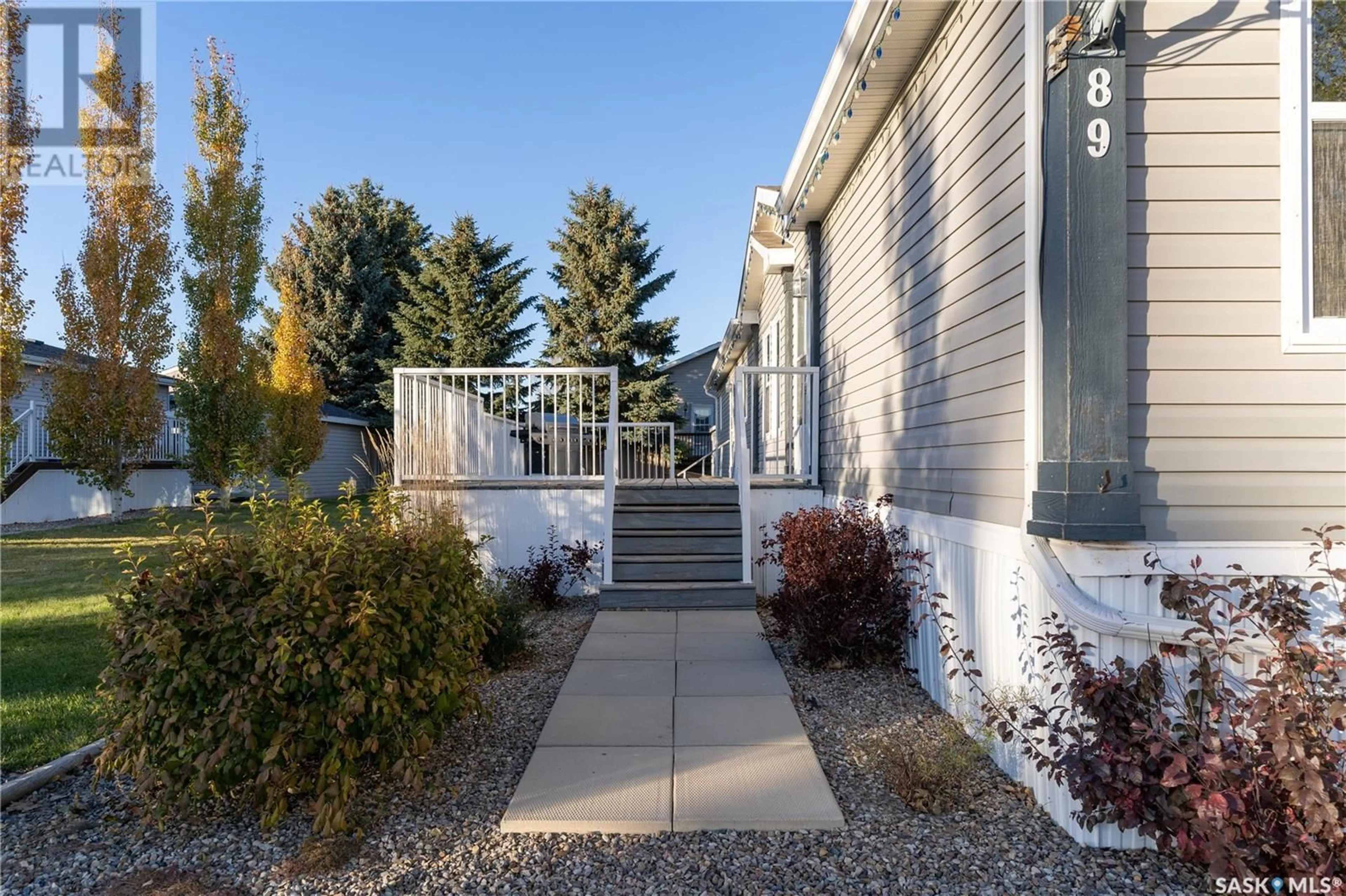 A pic from exterior of the house or condo, the fenced backyard for 89 Prairie Sun COURT, Swift Current Saskatchewan S9H3X6