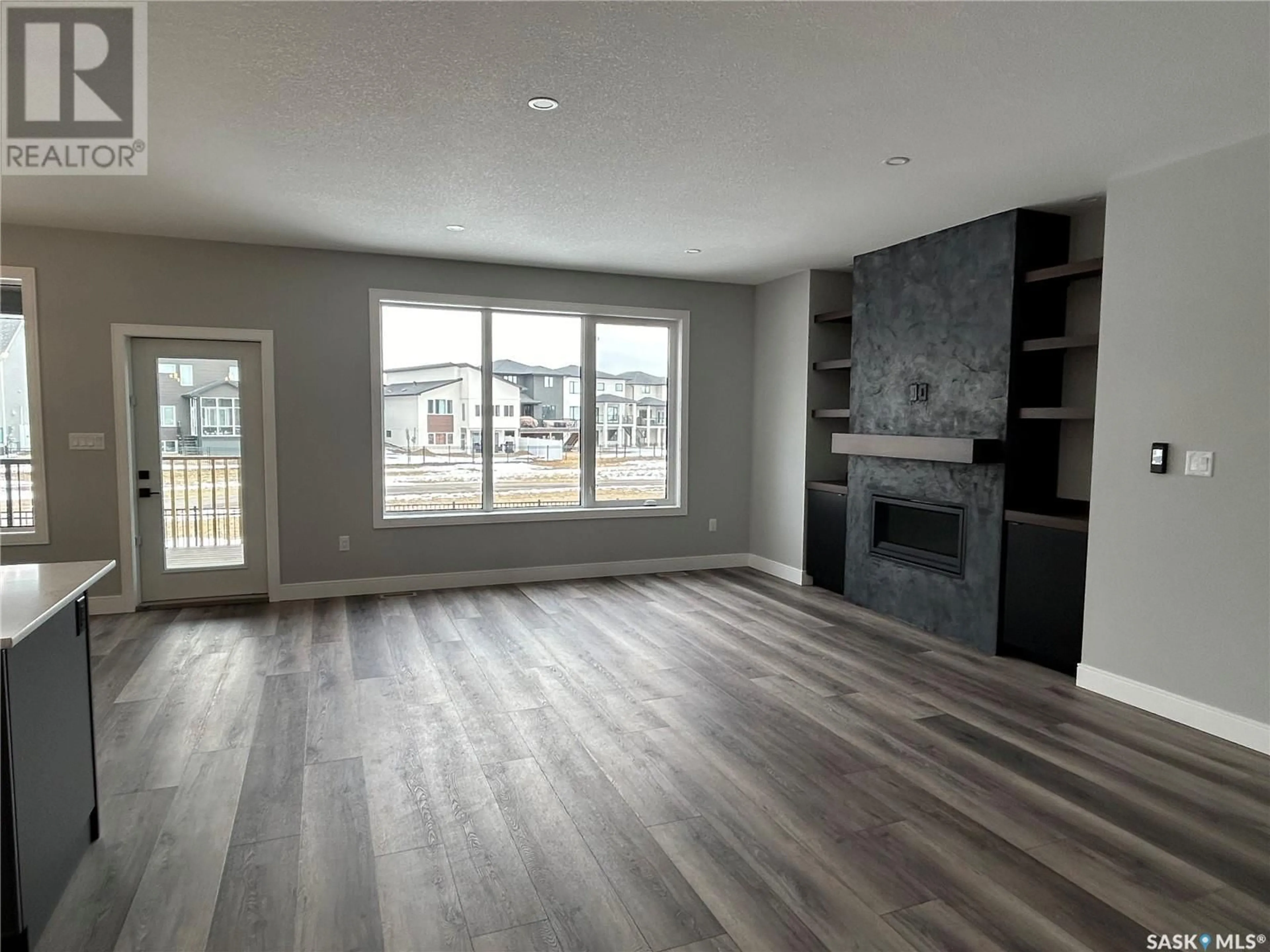 A pic of a room, wood floors for 5218 E Green CRESCENT, Regina Saskatchewan S4V3S9