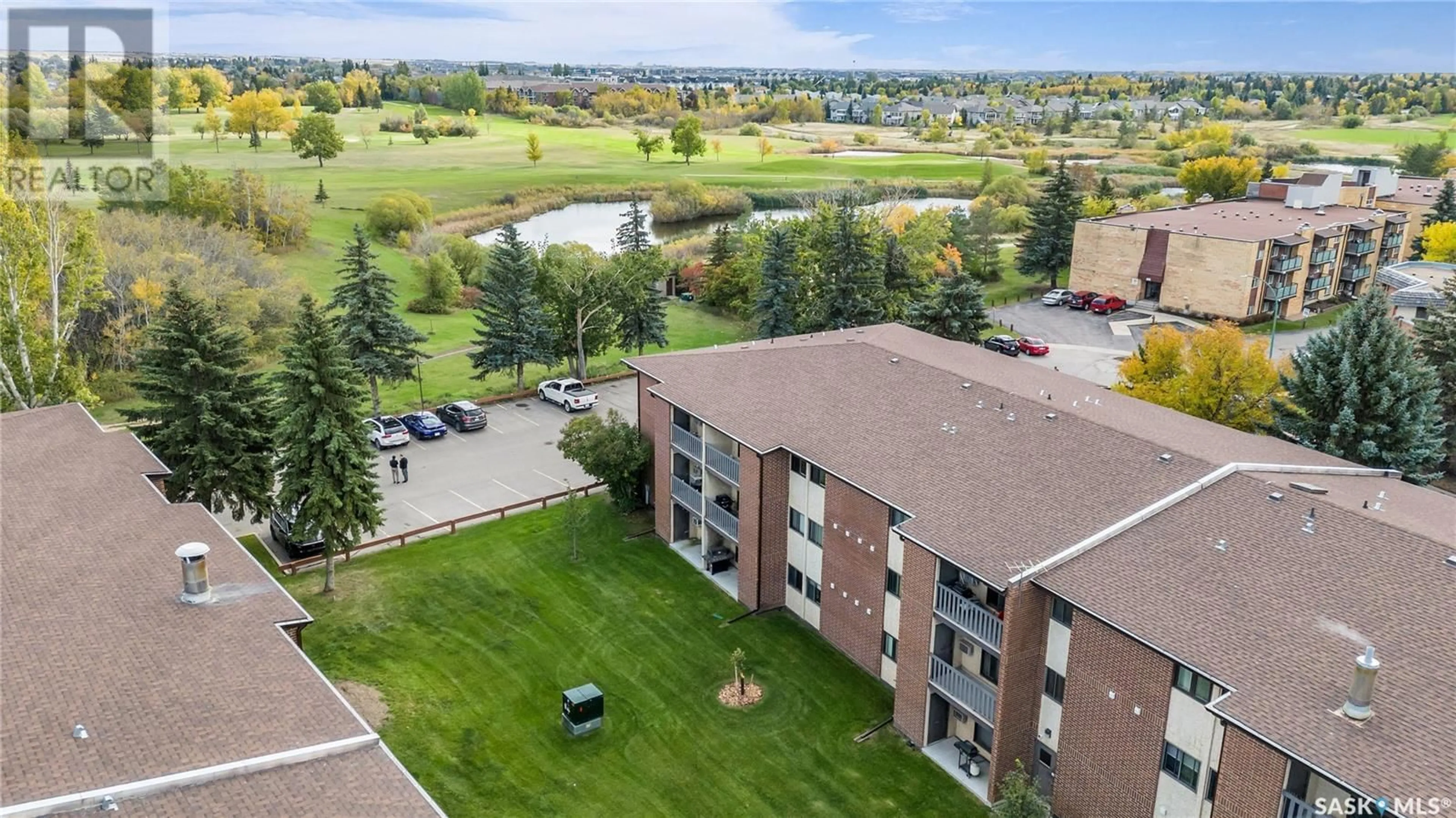 A pic from exterior of the house or condo, the front or back of building for 109 403 TAIT COURT, Saskatoon Saskatchewan S7H5L3