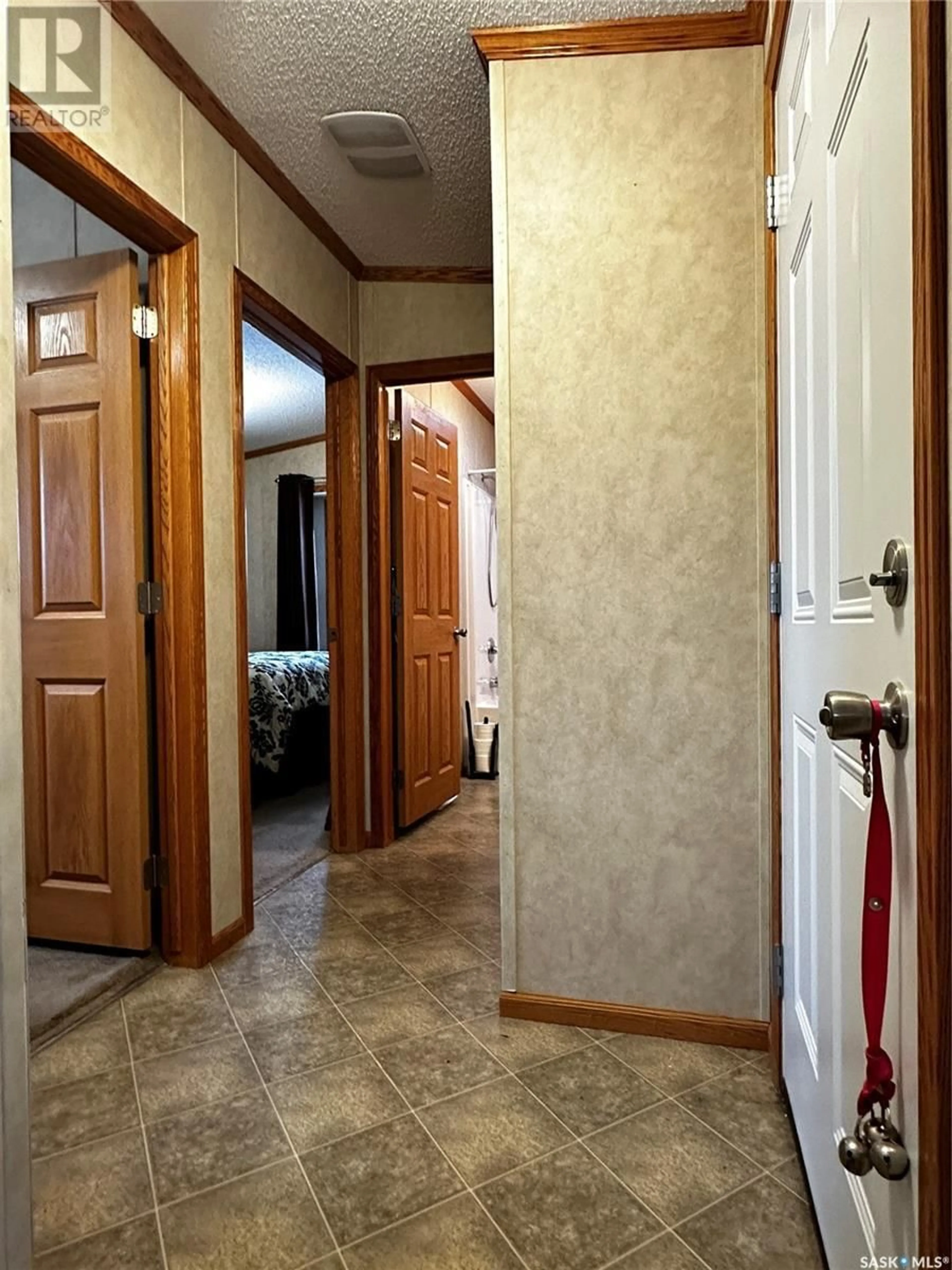 Indoor foyer, wood floors for #8 555 Dielschneider ROAD, Melville Saskatchewan S0A2P0