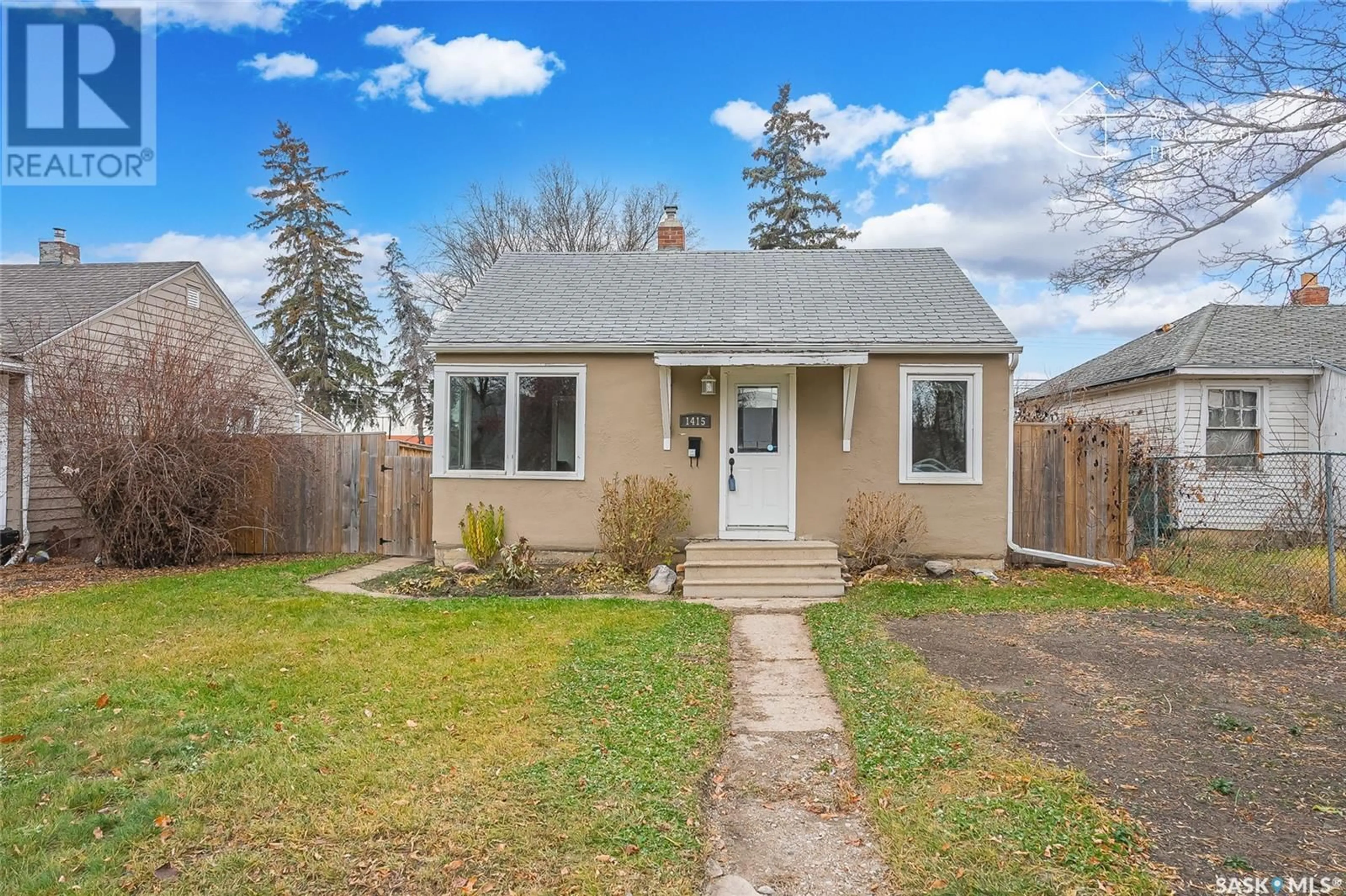 Frontside or backside of a home, cottage for 1415 1st AVENUE N, Saskatoon Saskatchewan S7K1Y9