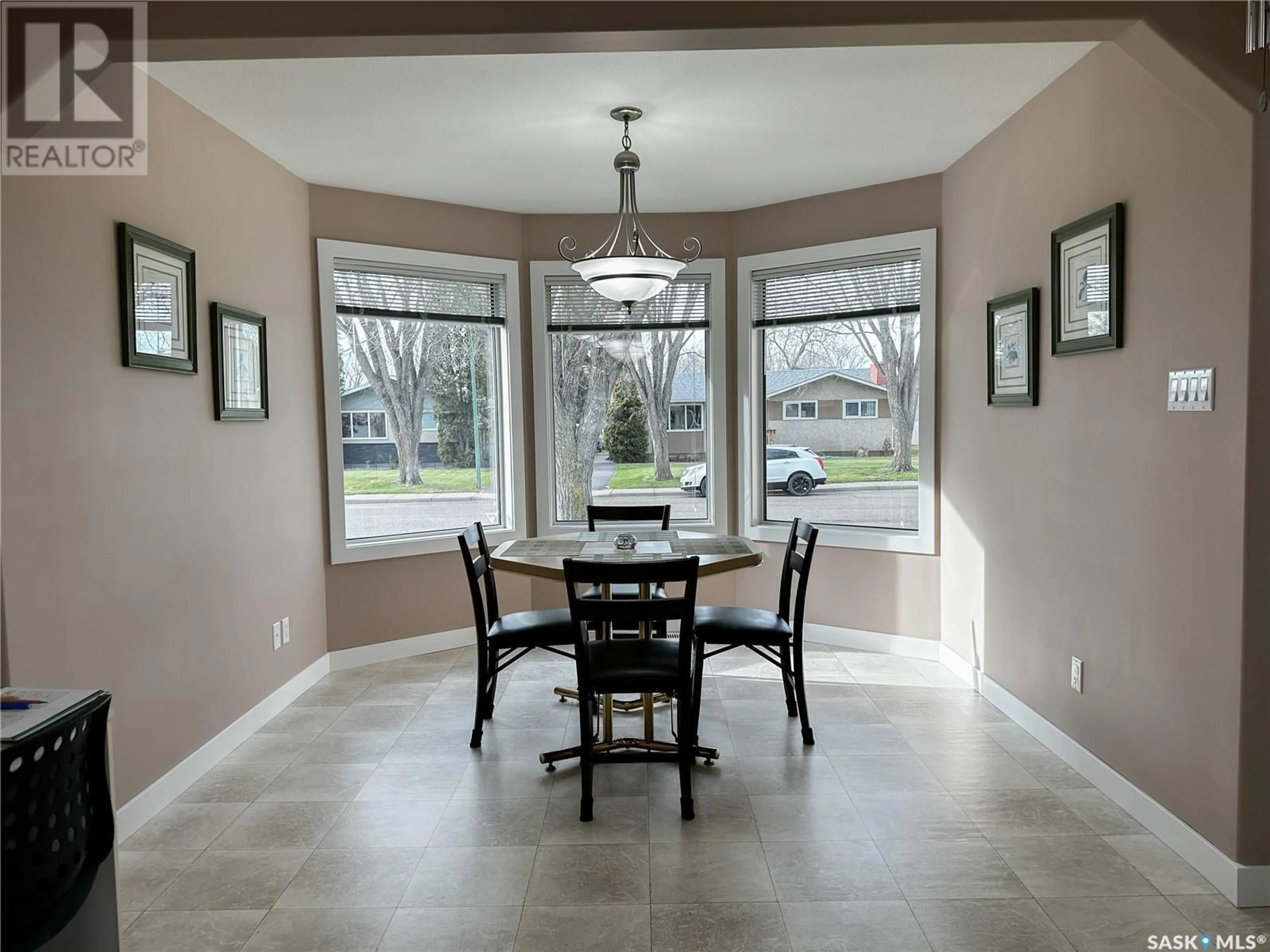 Dining room, wood floors, cottage for 2072 96th STREET, North Battleford Saskatchewan S9A0J4