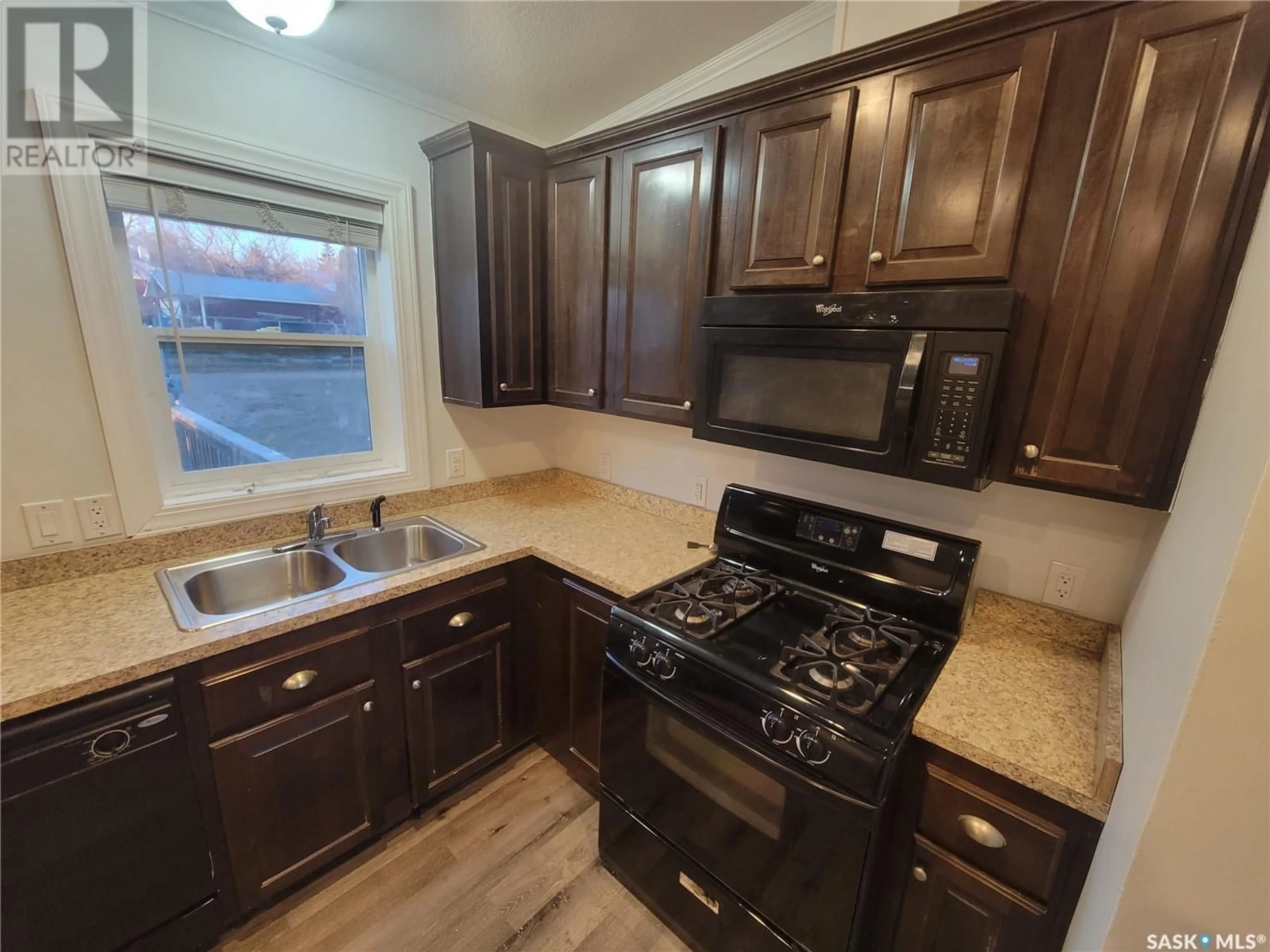 Standard kitchen, wood floors for 603 Pacific AVENUE, Kerrobert Saskatchewan S0L2A0