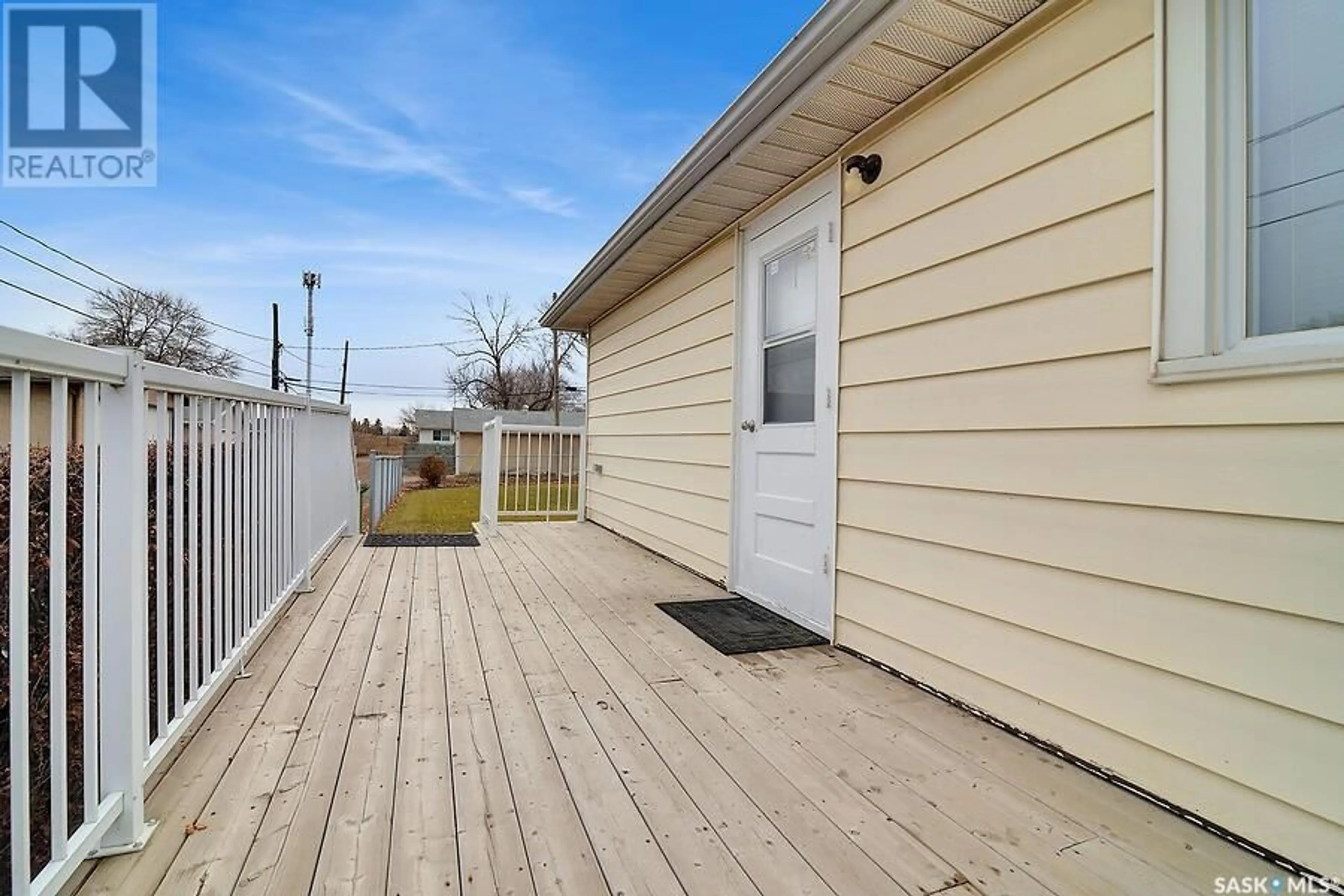 Frontside or backside of a home, the fenced backyard for 1519 Rupert STREET, Regina Saskatchewan S4X1M8