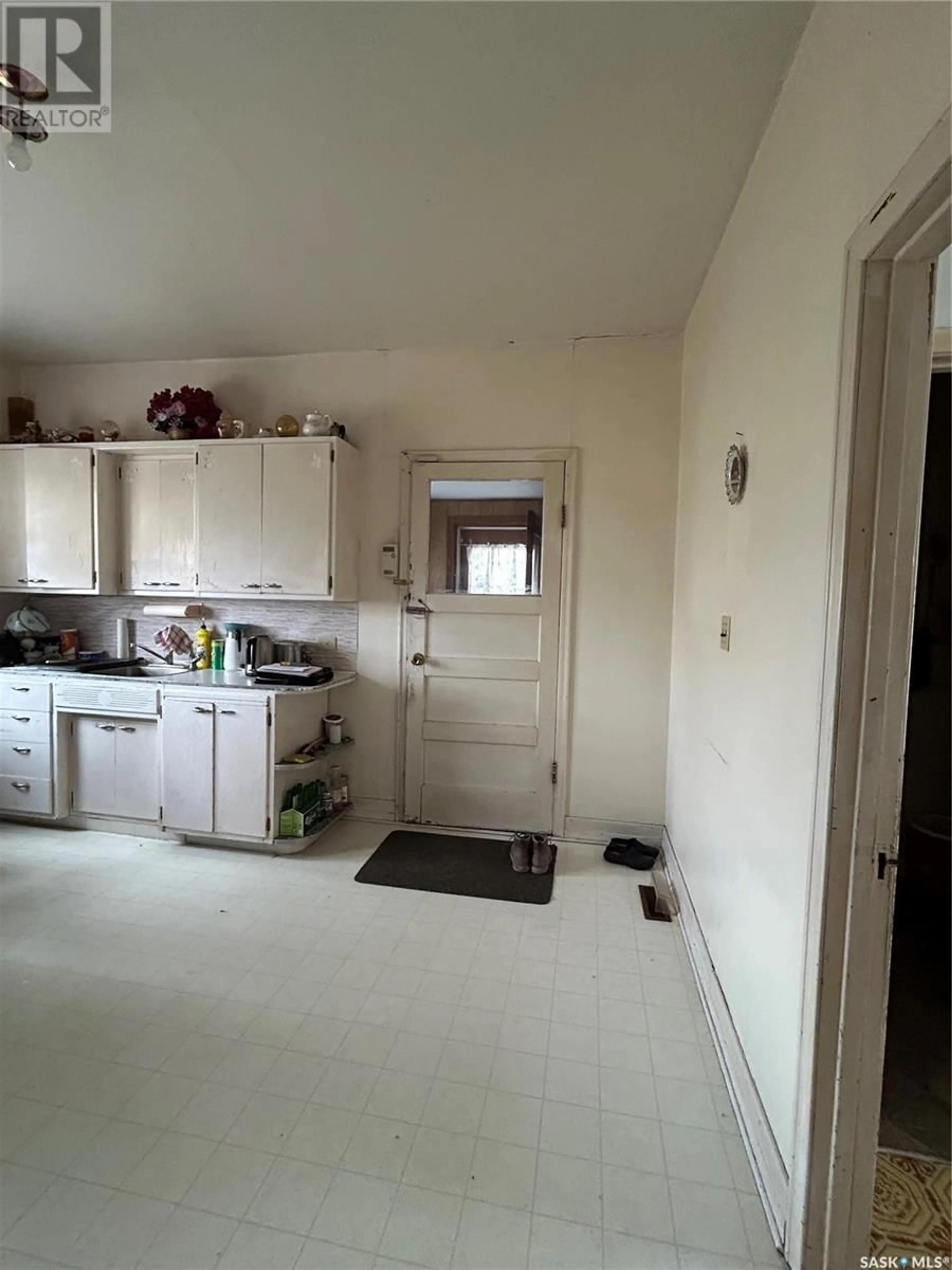 Kitchen, not visible floor, cottage for 106 Main STREET, Kelliher Saskatchewan S0A1V0