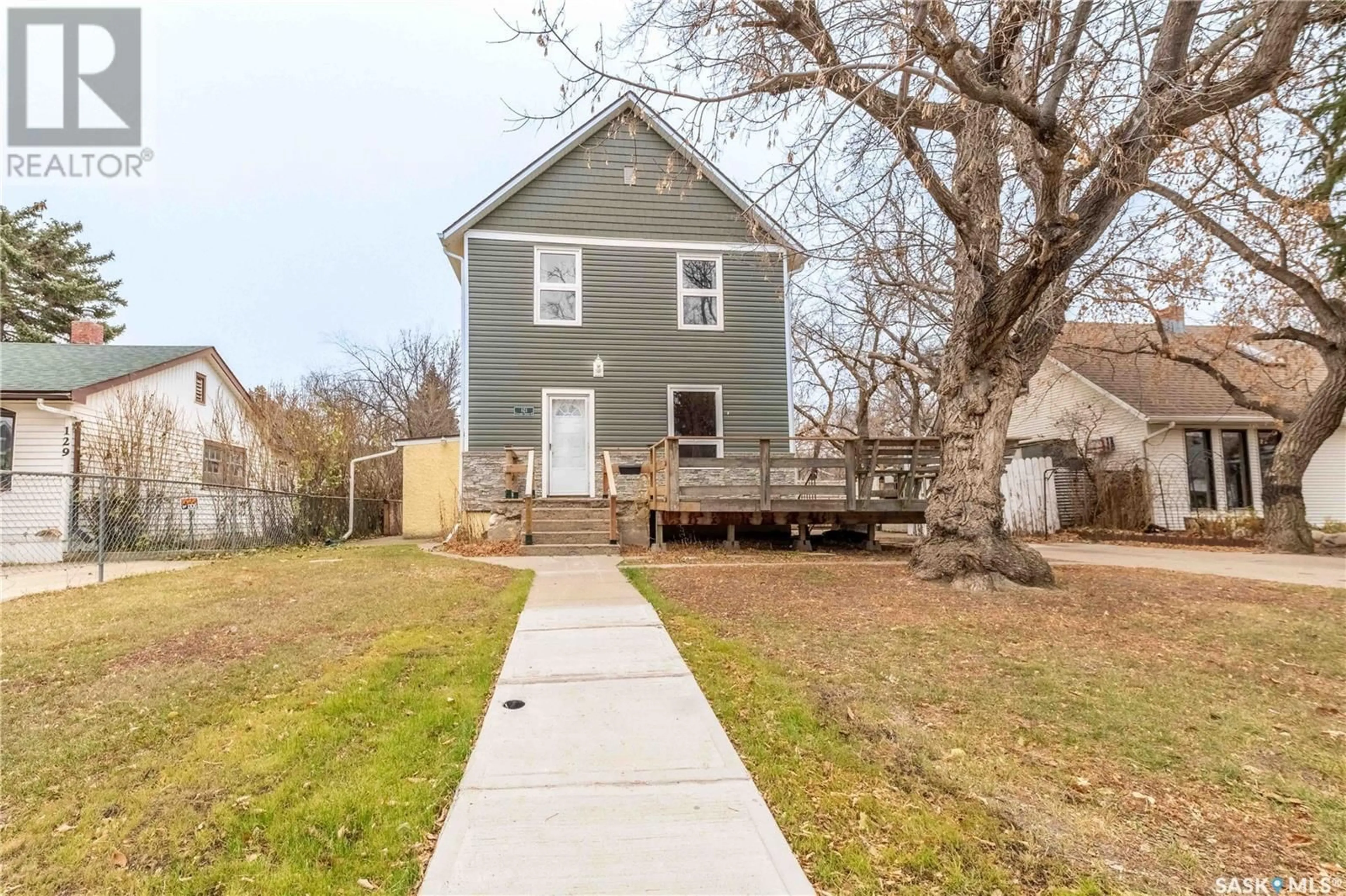 Frontside or backside of a home, the fenced backyard for 121 LILLOOET STREET E, Moose Jaw Saskatchewan S6H5V2