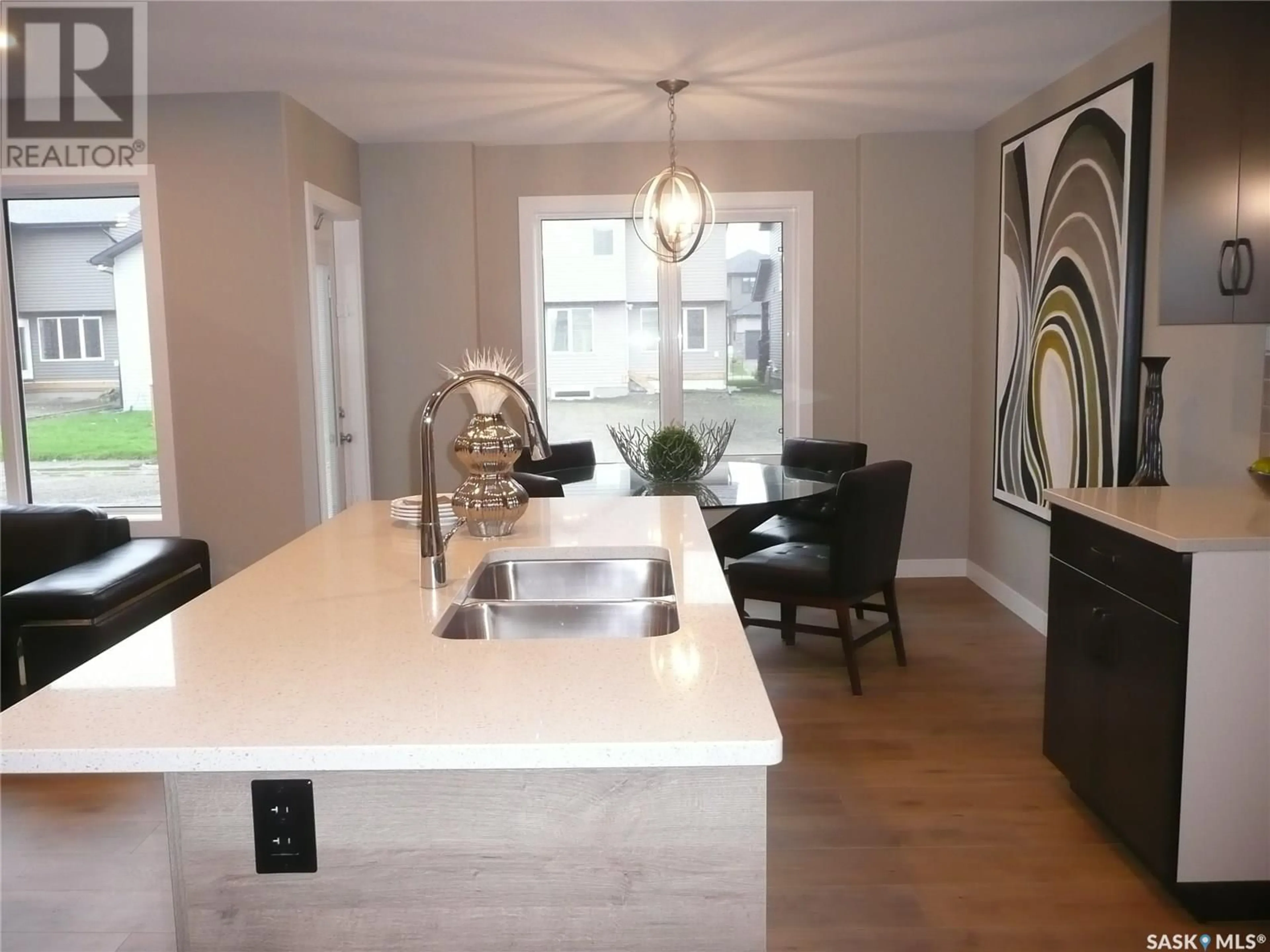 Contemporary kitchen, wood floors for 190 Kostiuk CRESCENT, Saskatoon Saskatchewan S7W0L8