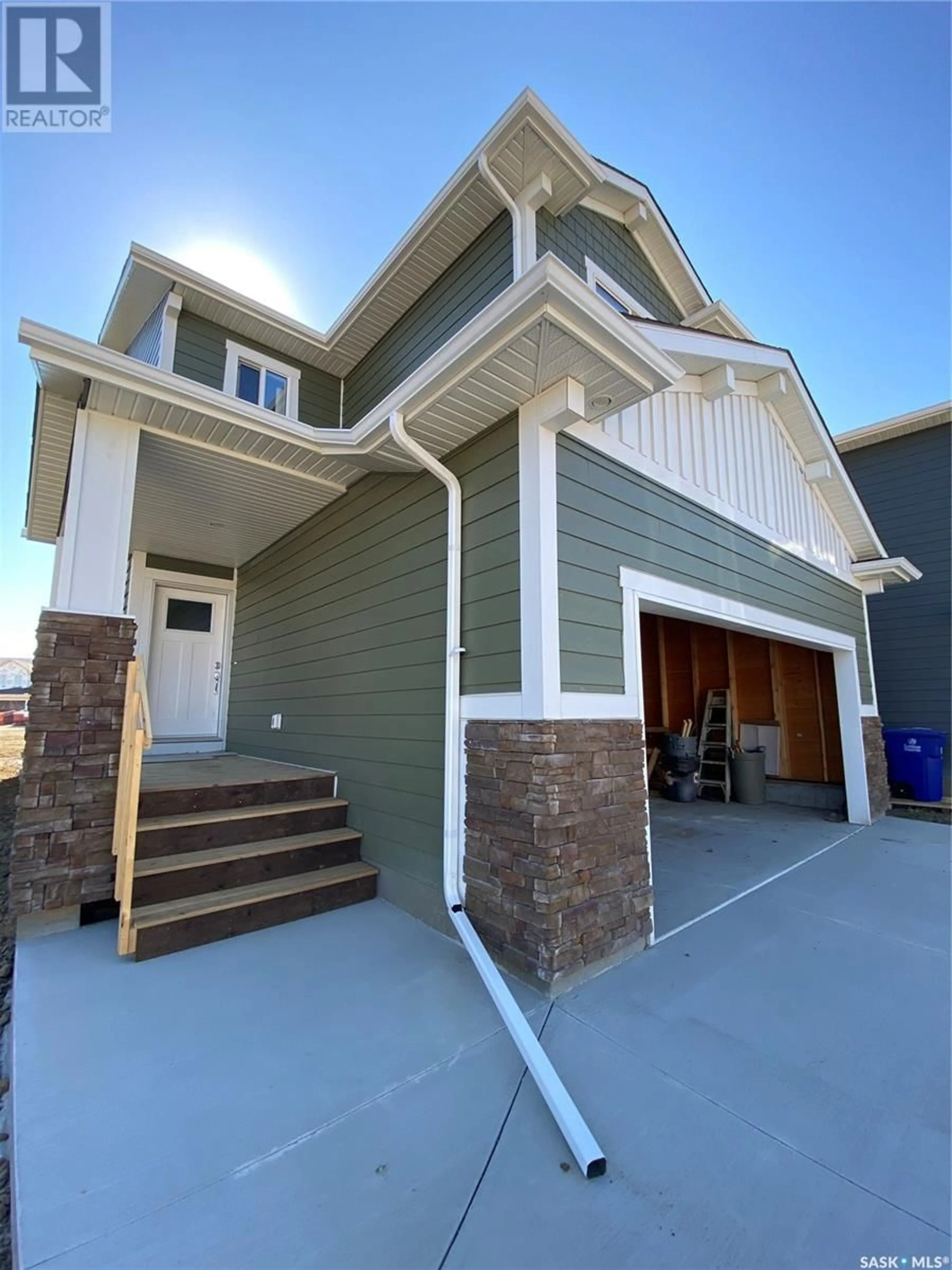 Frontside or backside of a home, the street view for 106 Kostiuk CRESCENT, Saskatoon Saskatchewan S7W0L8