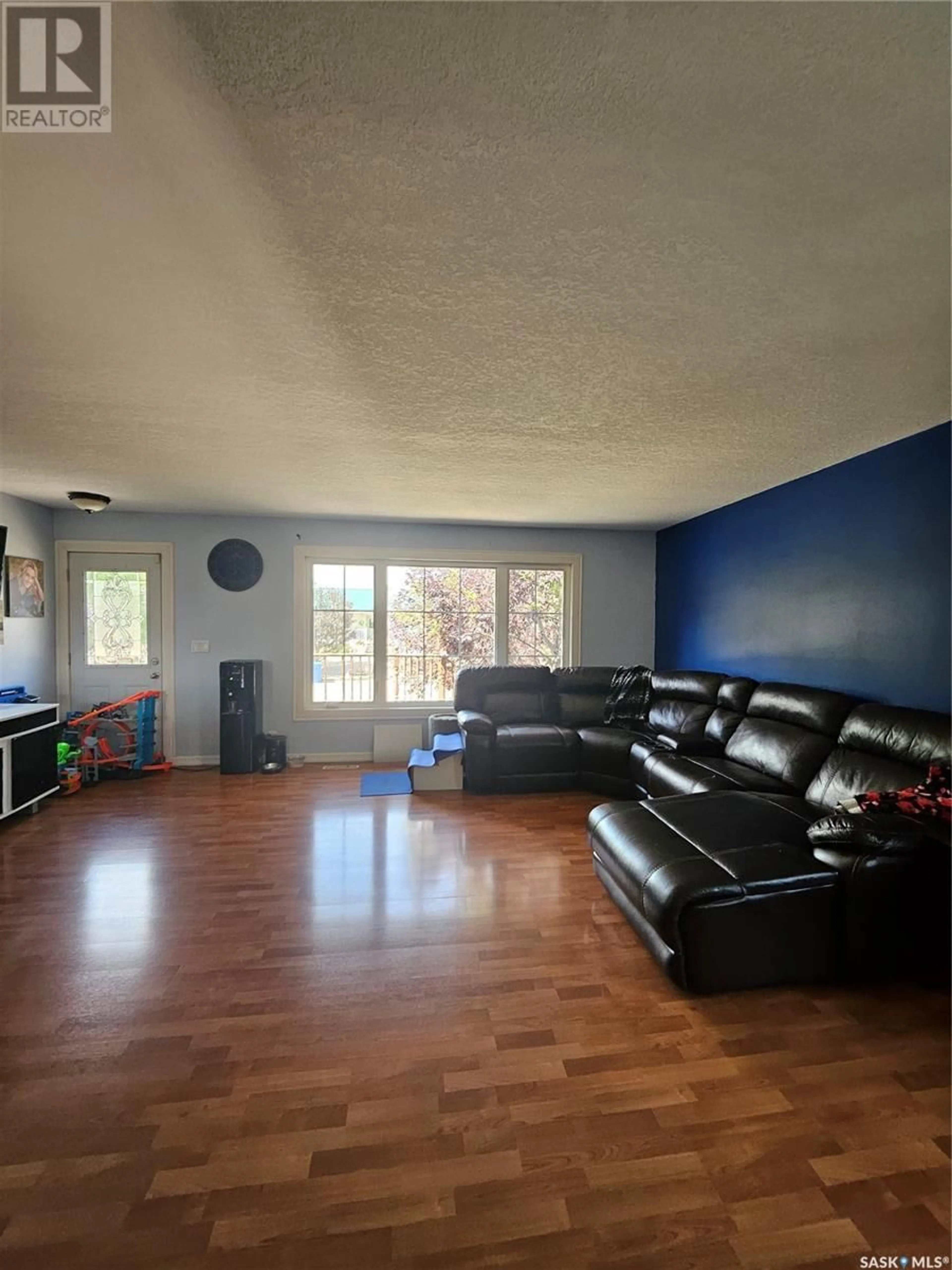 A pic of a room, wood floors for 406 First AVENUE E, Lampman Saskatchewan S0C1N0