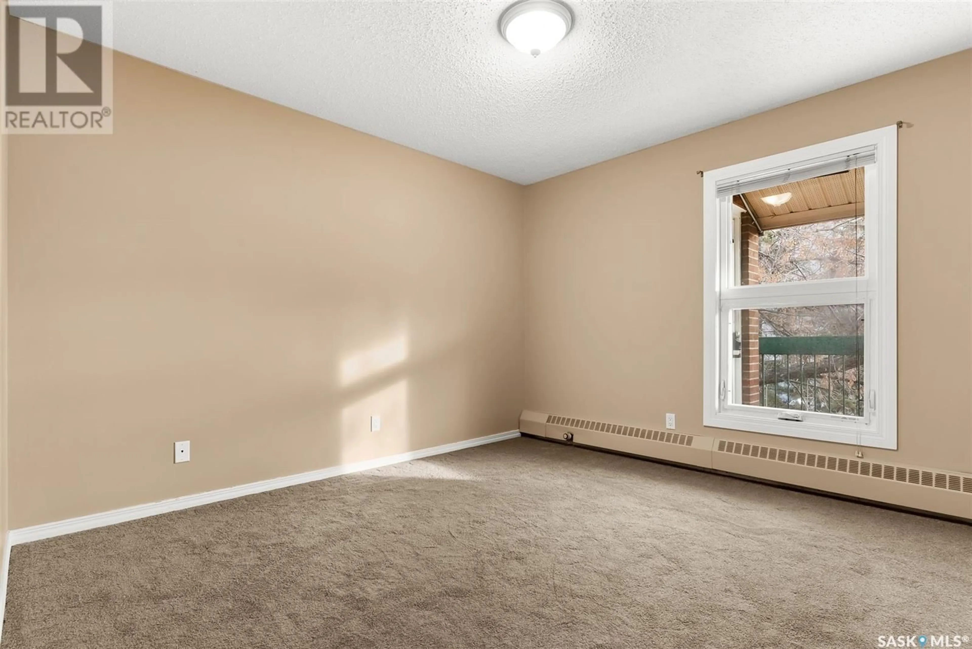 A pic of a room, carpet floors for 18B Nollet AVENUE, Regina Saskatchewan S4T7P9