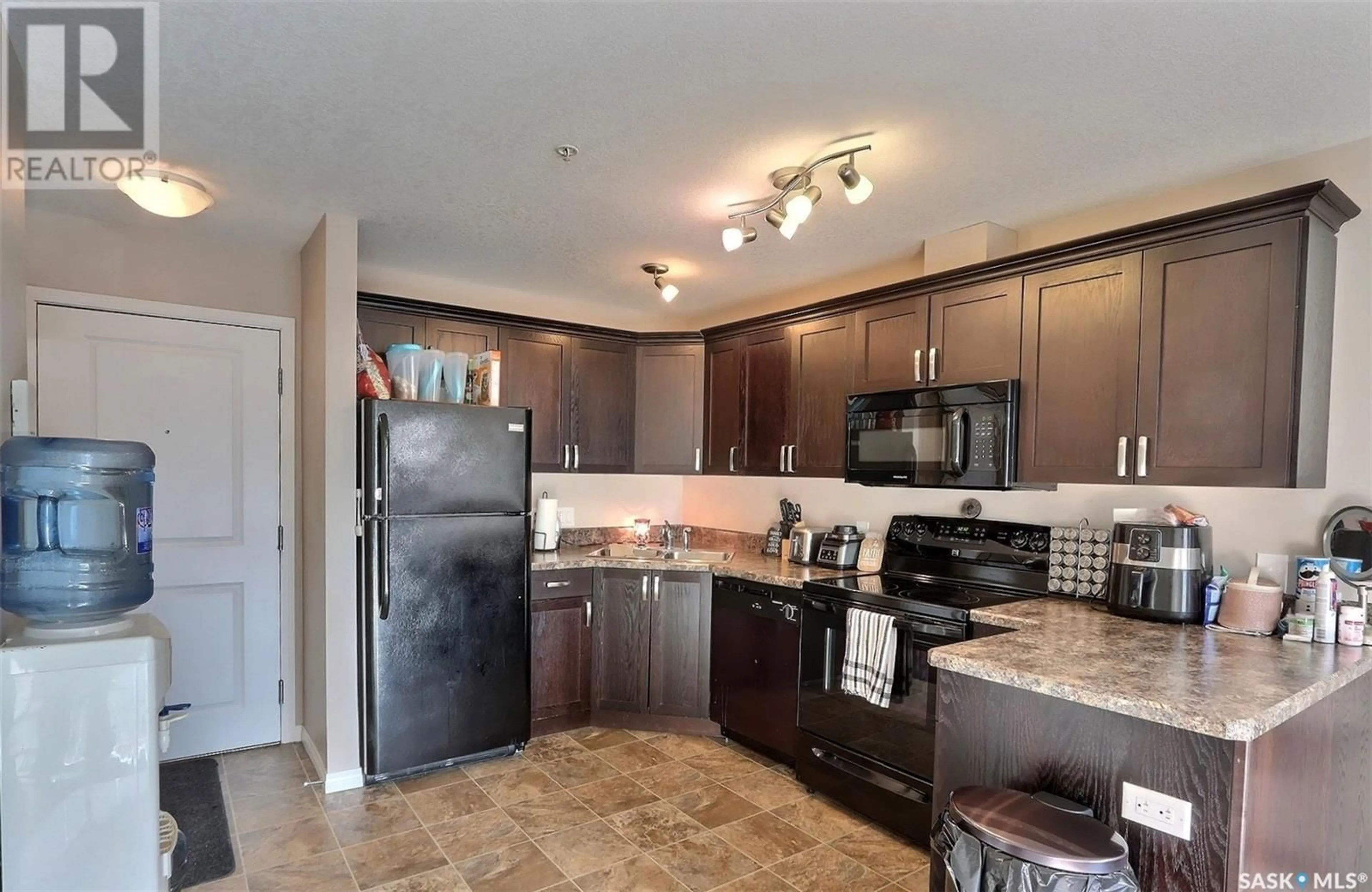 Standard kitchen, wood floors, cottage for 102 1501 15th STREET E, Prince Albert Saskatchewan S6V7C3