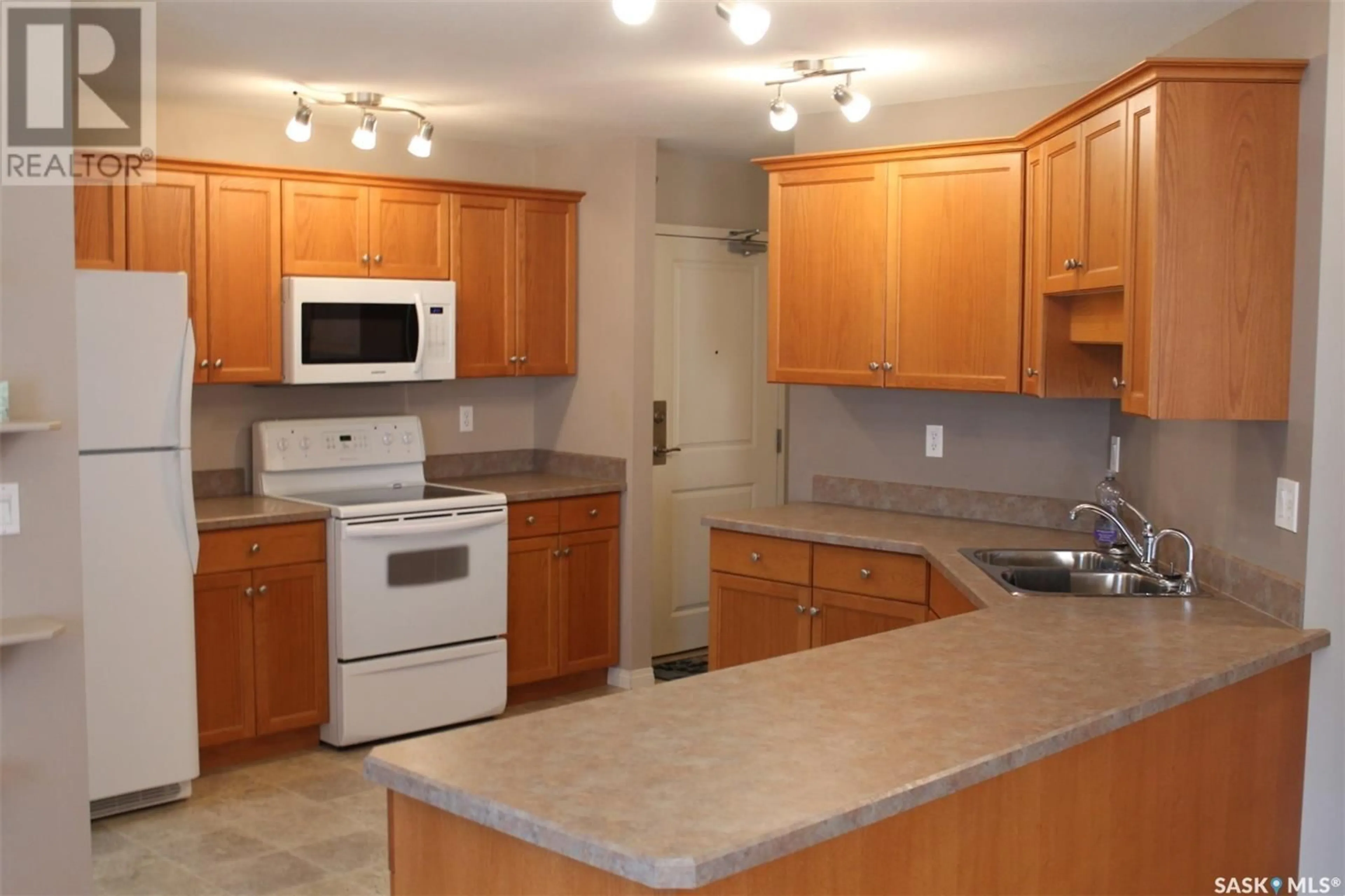 Standard kitchen, wood floors, cottage for 602 2221 Adelaide STREET E, Saskatoon Saskatchewan S7J5L9