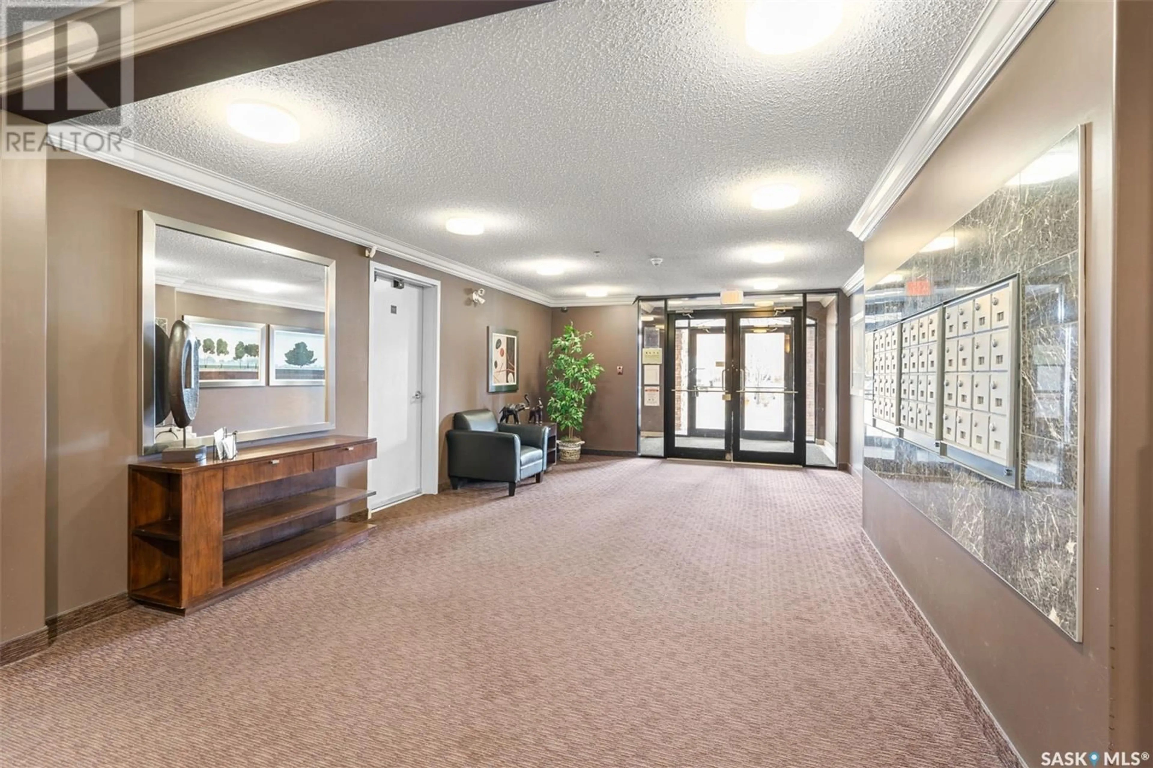 Indoor lobby, carpet floors for A207 103 Wellman CRESCENT, Saskatoon Saskatchewan S7T0C1