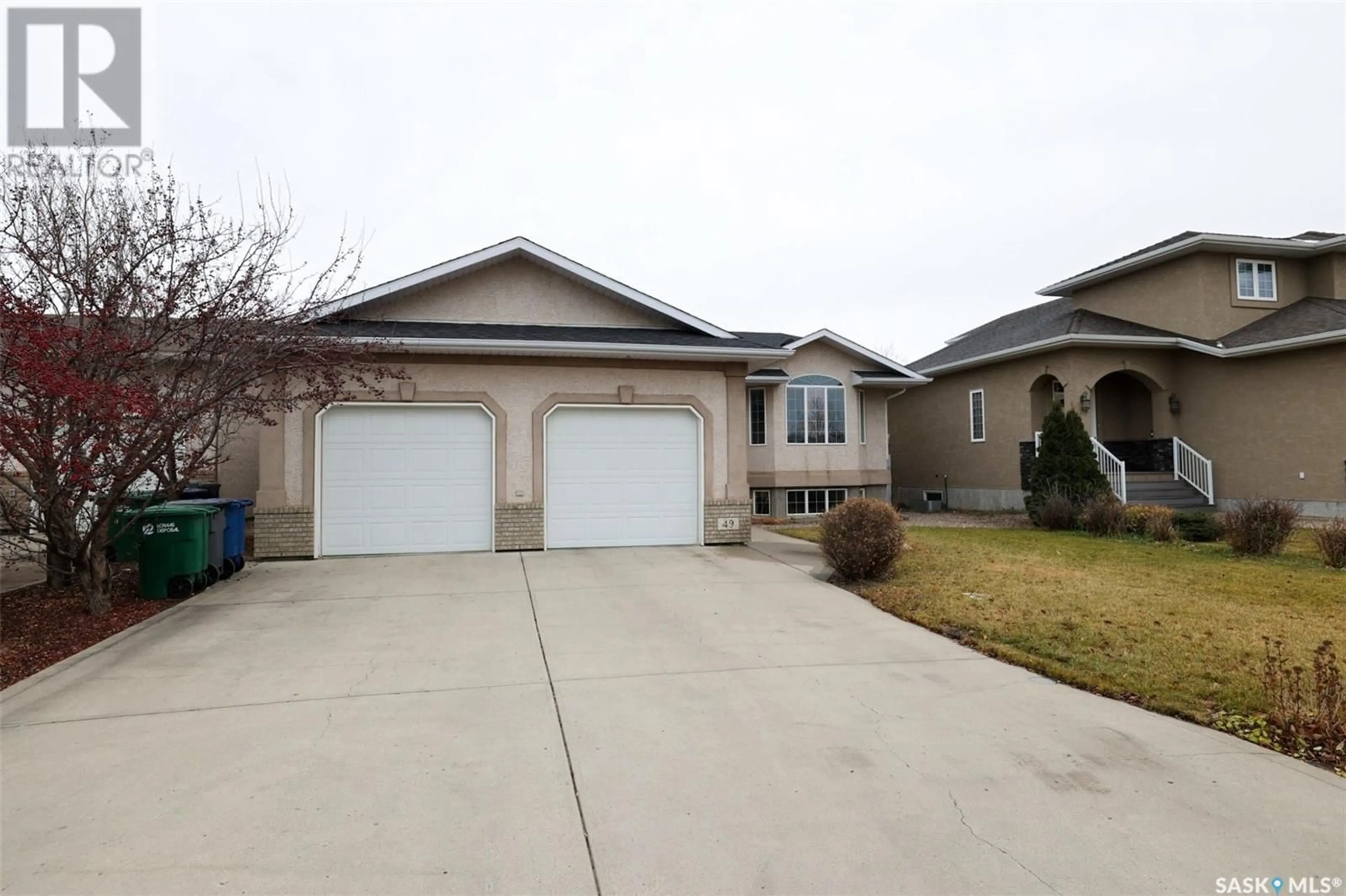 Home with vinyl exterior material, street for 49 QU'APPELLE CRESCENT, Balgonie Saskatchewan S0G0E0