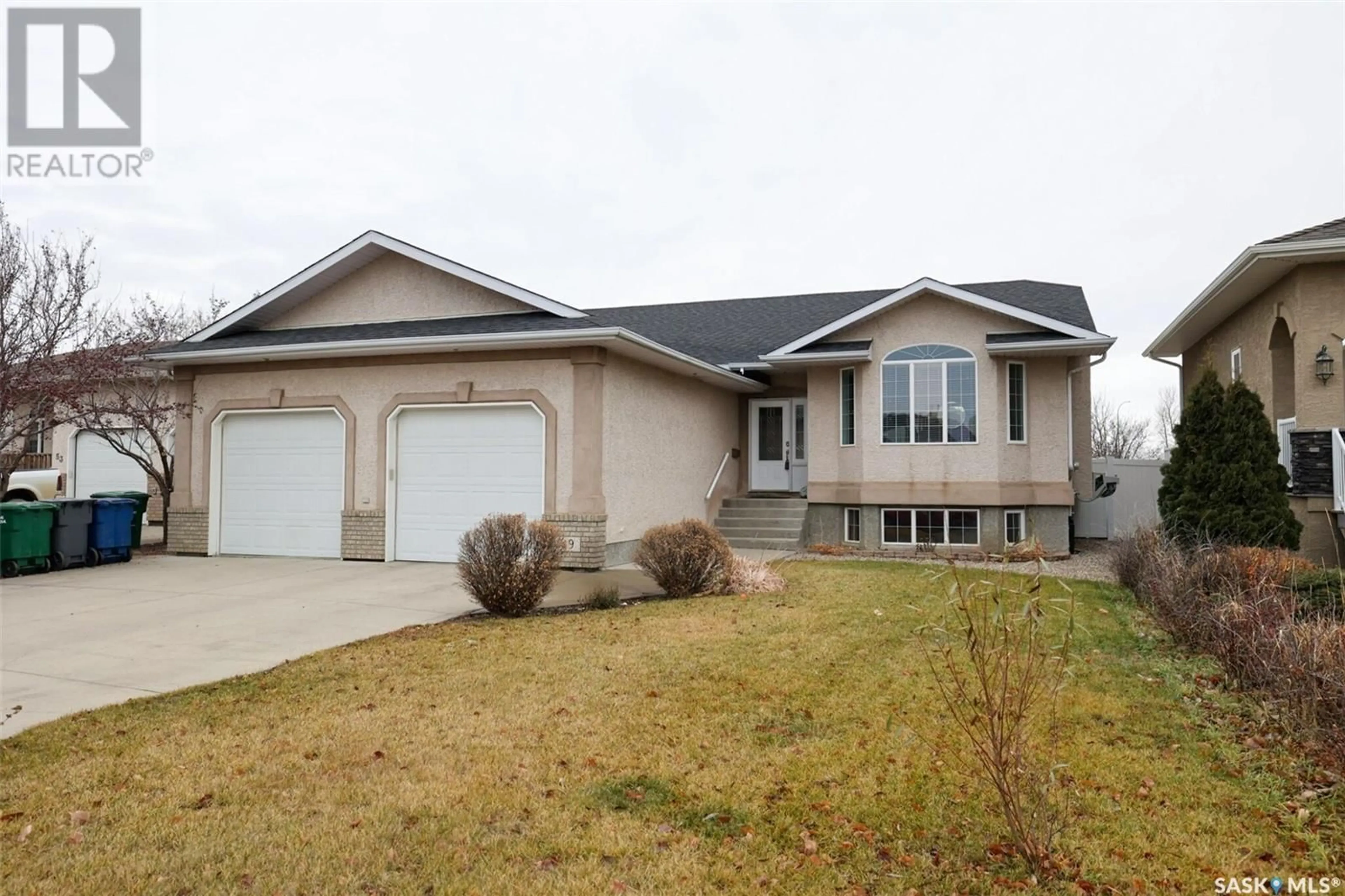Home with vinyl exterior material, street for 49 QU'APPELLE CRESCENT, Balgonie Saskatchewan S0G0E0